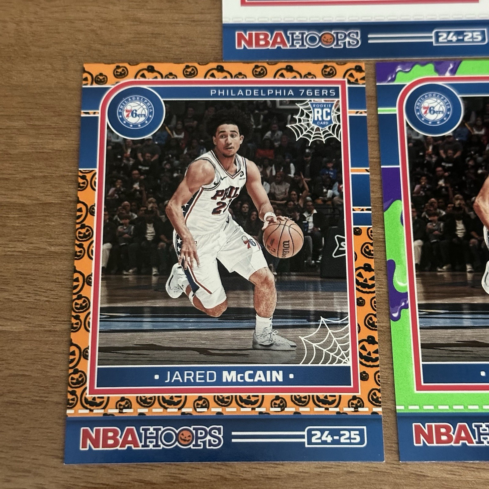 2024-25 Panini Haunted Hoops Jared McCain #263 Orange Pumpkin Slime Rookie 76ers