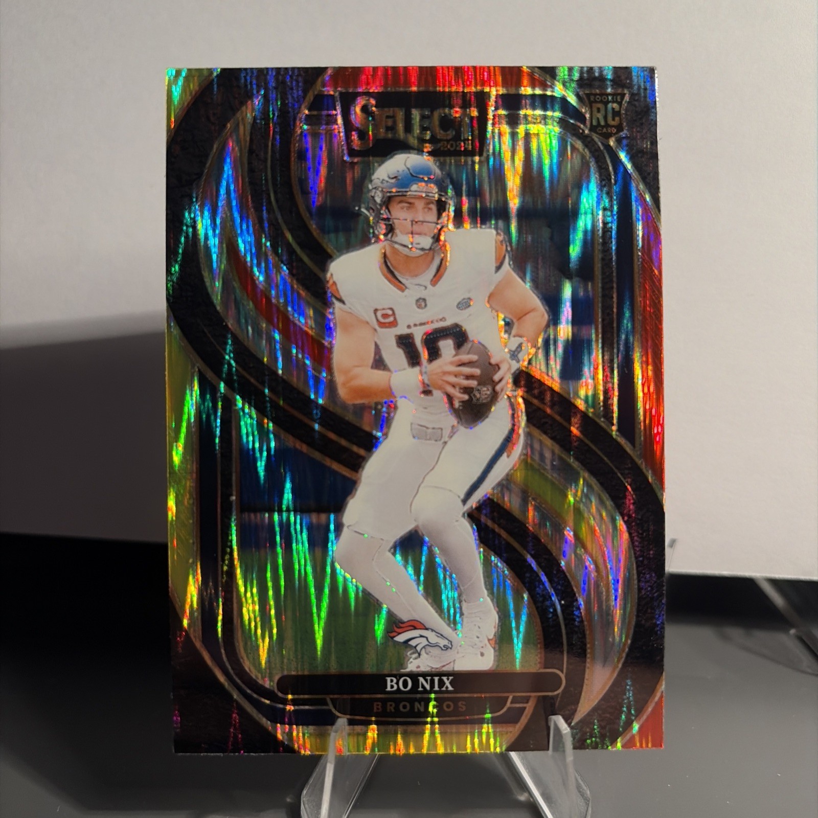 2024 Panini Select – Premier Level Bo Nix #117 Red & Yellow Shock Prizm (RC)