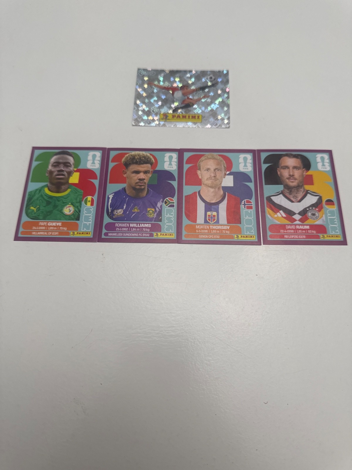 2026 Panini World Cup Purple Parallel Lot 4 + #00 panini logo Thorsby Raum Gueye