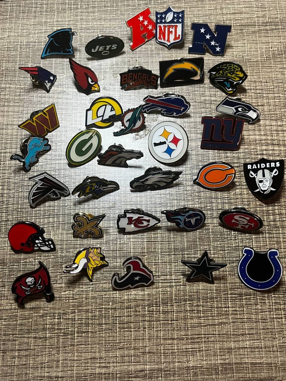 NFL Team Logo Pin Set – Lot of 35 Pins – Mixed Teams – Football Collectible