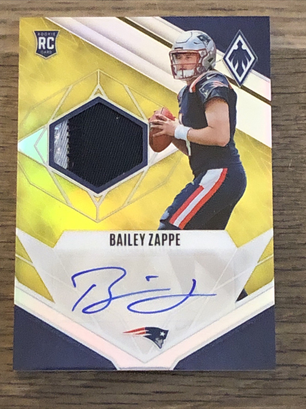 2022 Panini Phoenix Football – Bailey Zappe #RJA-BZ RPA Yellow /75 (AU, MEM, RC)