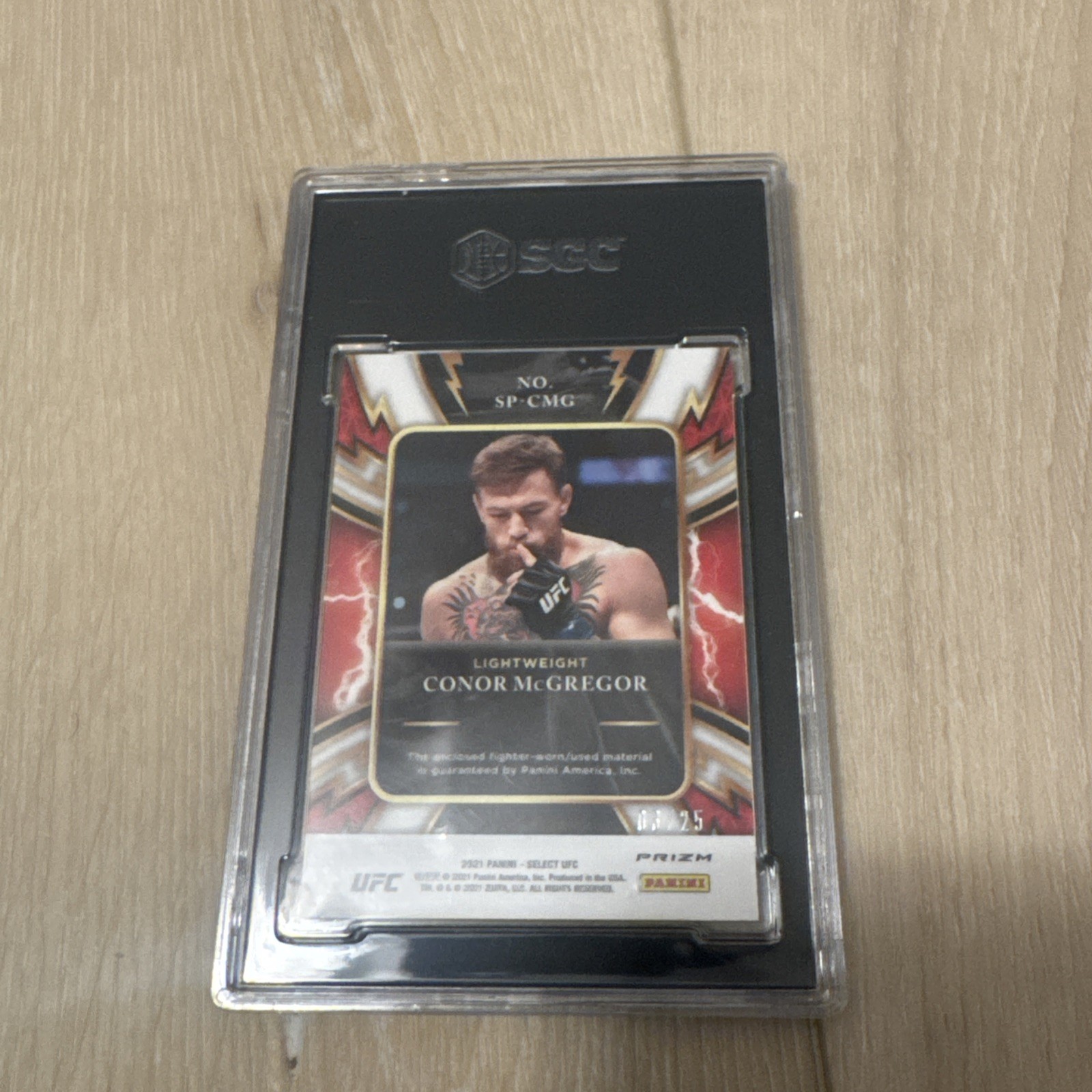 2021 Panini Select UFC Sparks Conor McGregor Relic Tie Dye /25 Blood Stain