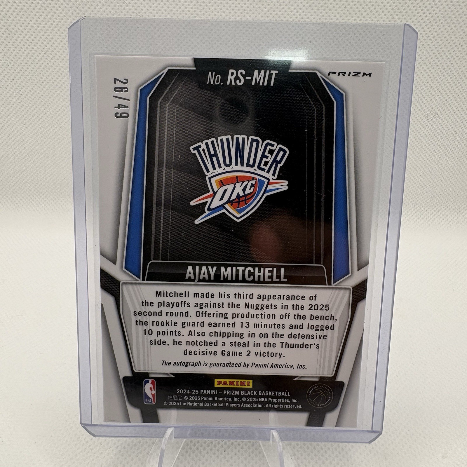 2024-25 Panini Prizm Black Ajay Mitchell Blue Prizm Auto /49 (RC) #RS-MIT