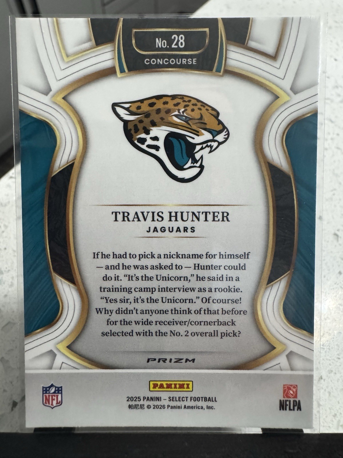 2025 Panini Select – Concourse Travis Hunter #28 Black & Green Shock Prizm (RC)