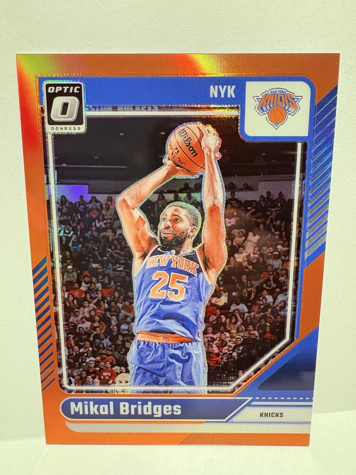 2024-25 Panini Donruss Optic – Mikal Bridges #217 Orange Prizm /175