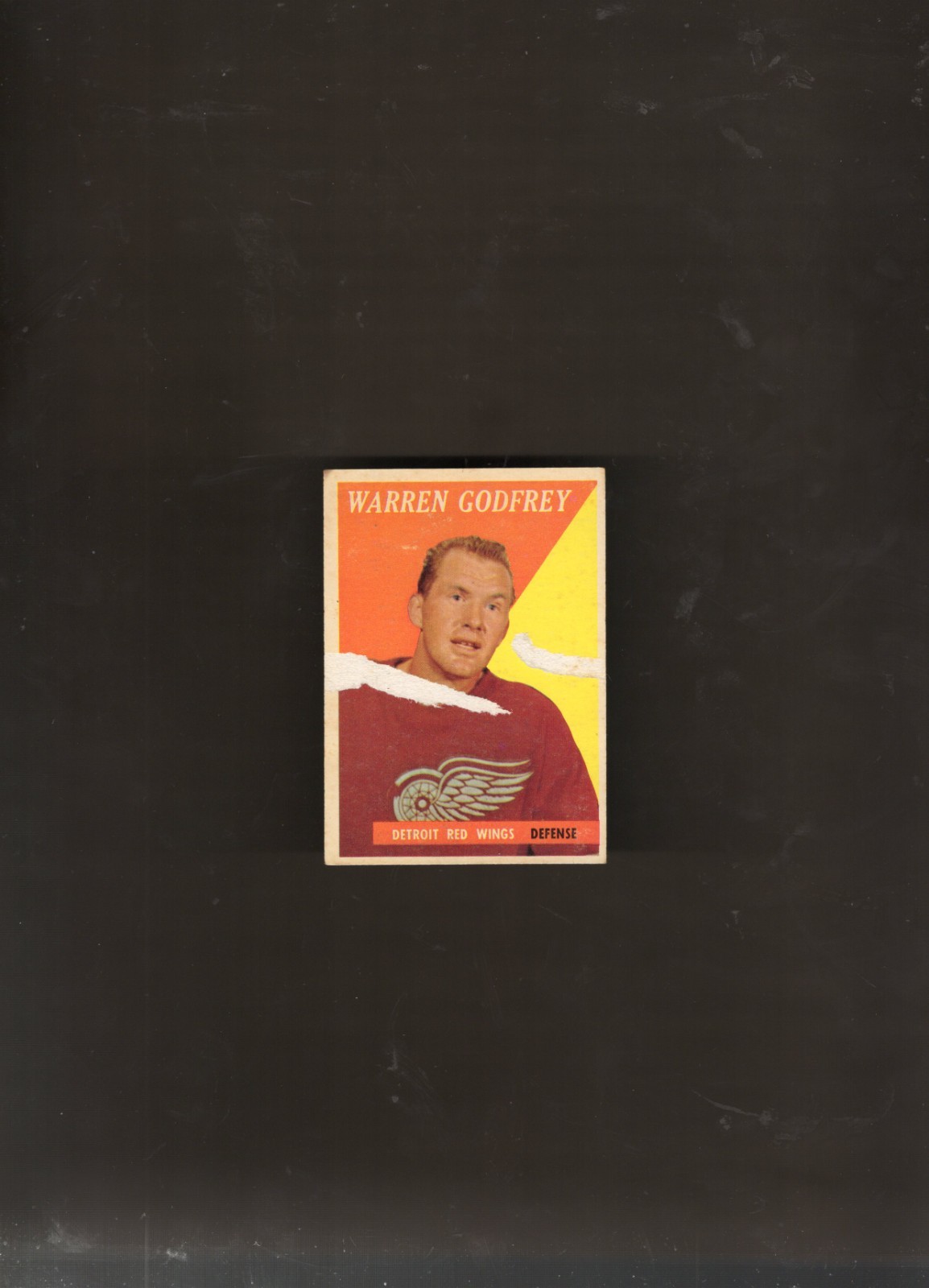1958-59 TOPPS HOCKEY CARD #58 WARREN GODFREY PAPER PULLS ON FRONT RED WINGS
