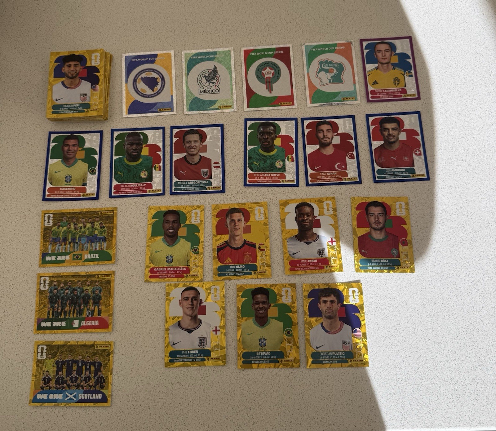 90 Gold Crumple Stickers Lot – 6 Blue – 1 Purple – Estevao, Pullisic, Brahim +
