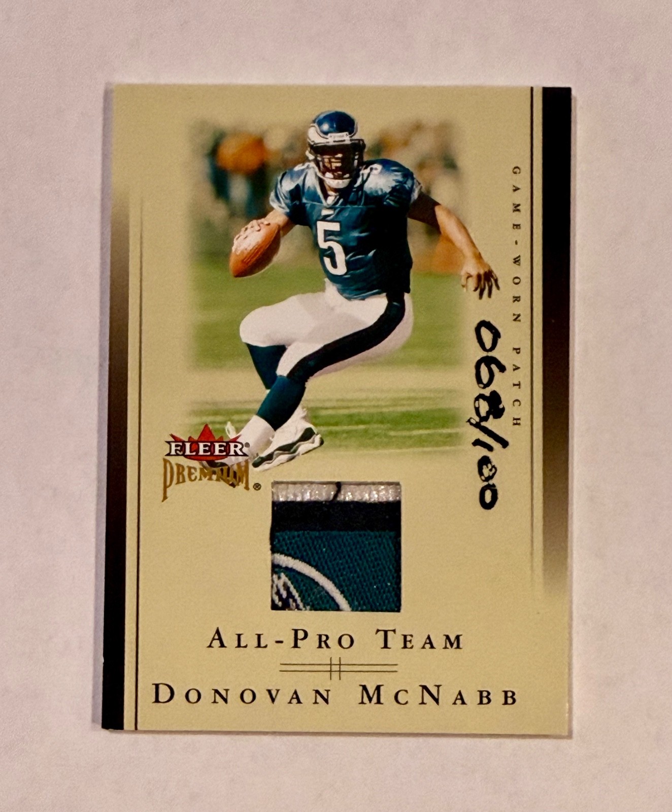 Donovan McNabb 2002 Fleer Premium multi color prime Logo jersey patch – Eagles