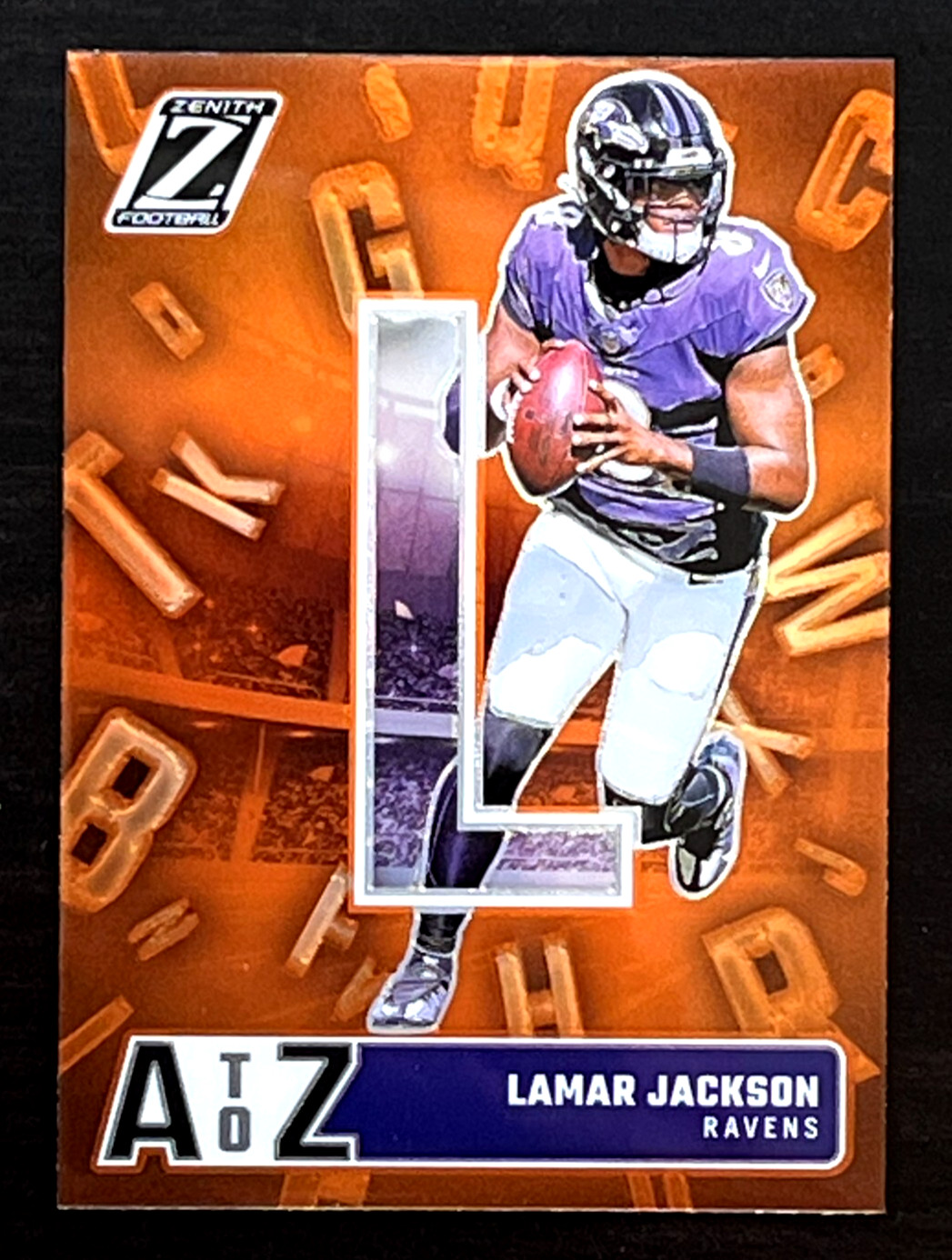 Lamar Jackson 2024 Panini Zenith A TO Z Orange Prizm Baltimore Ravens #12