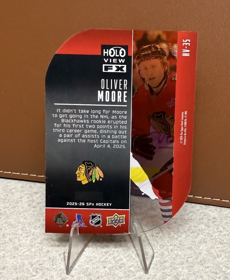 Oliver Moore 2025-26 Upper Deck SPx #HV-35 Holoview F/X Rookie RC SP Blackhawks