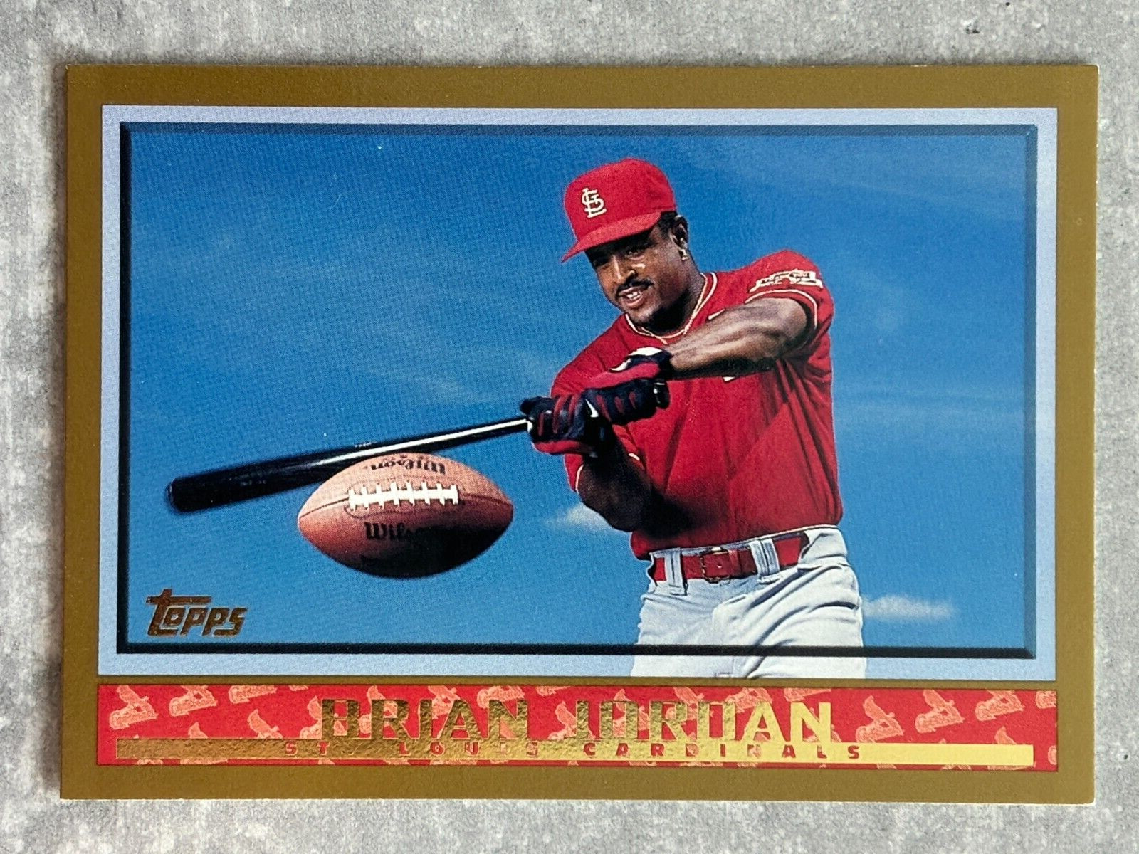 1998 Topps BRIAN JORDAN Two Sport Star “Batting a Football” Funny Real Card #287