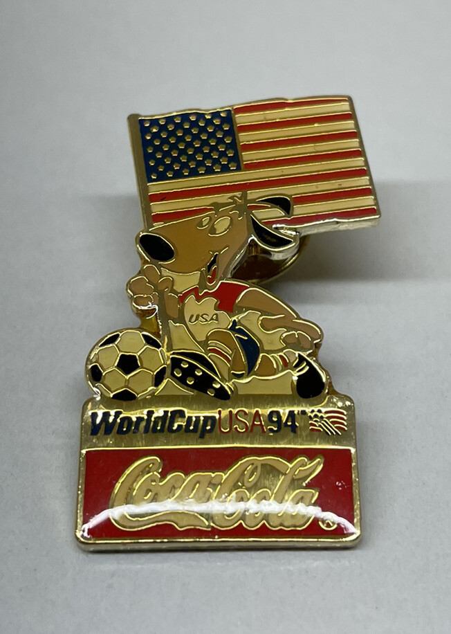 ⚽️ Vintage1994 FIFA World Cup USA Coca Cola Stryker Mascot Holding Flag Pin