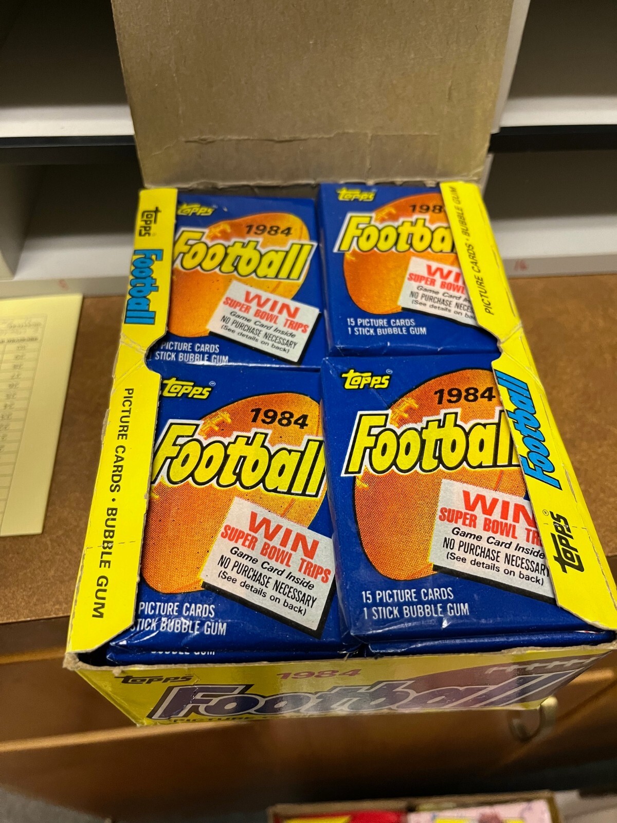 1984 TOPPS FOOTBALL, ONE UNOPENED UNSEARCHED PACK OF 15 CARDS, ELWAY OR MARINO?