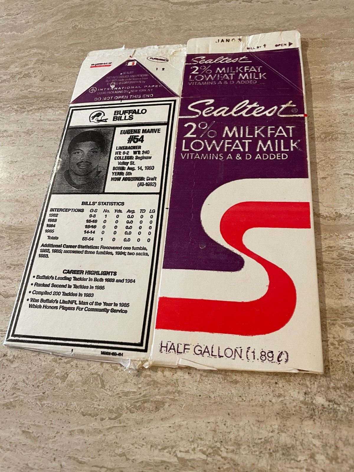1986 Buffalo Bills Sealtest Milk Card – #4H Eugene Marve – Black Tint – NR-MT