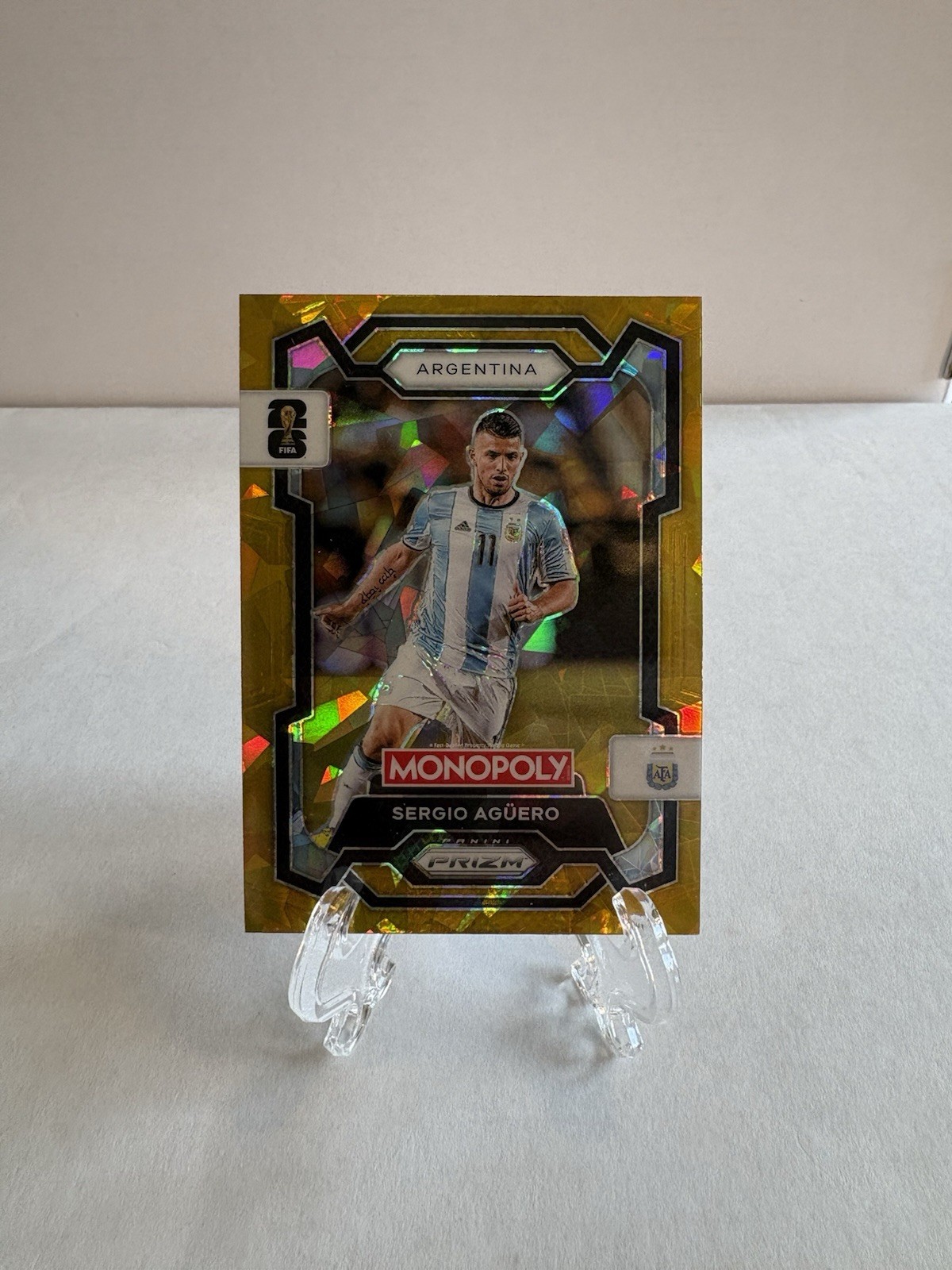 2026 Monopoly Fifa World Cup – Sergio Aguero #6 Gold Cracked Ice Prizm (Z) (a)