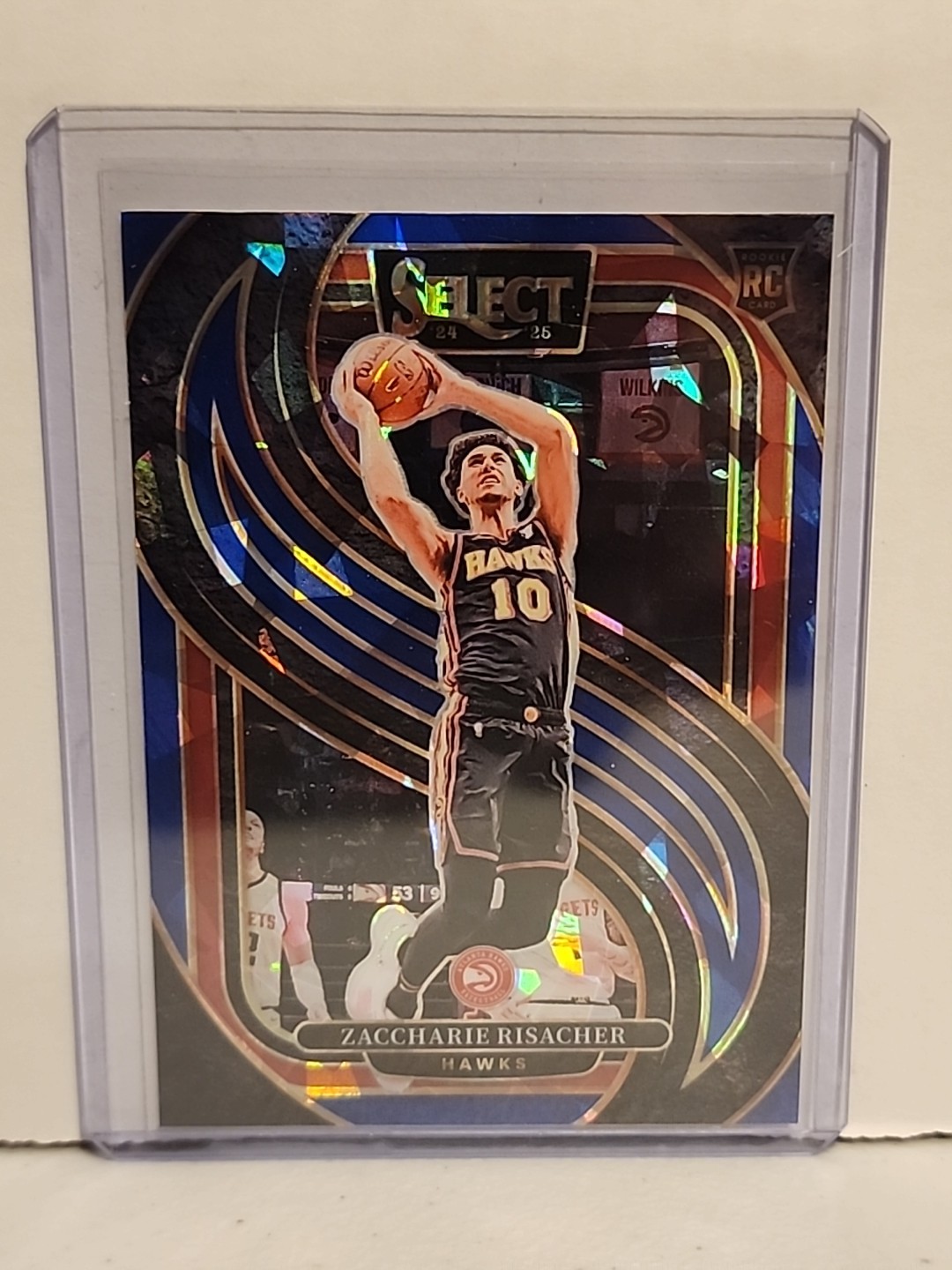 2024-25 Select – Premier Level Zaccharie Risacher Blue Cracked Ice Prizm (RC)