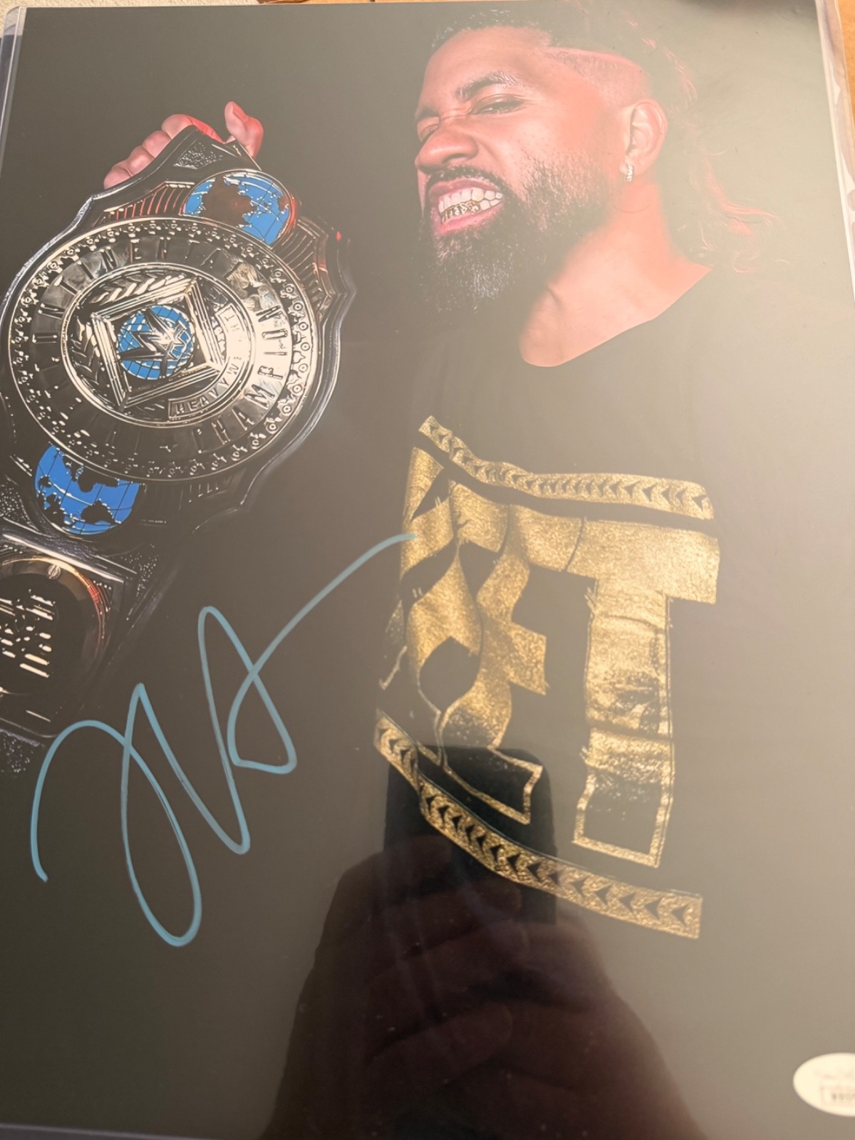 JEY USO SIGNED IC TITLE 11×14 with jsa