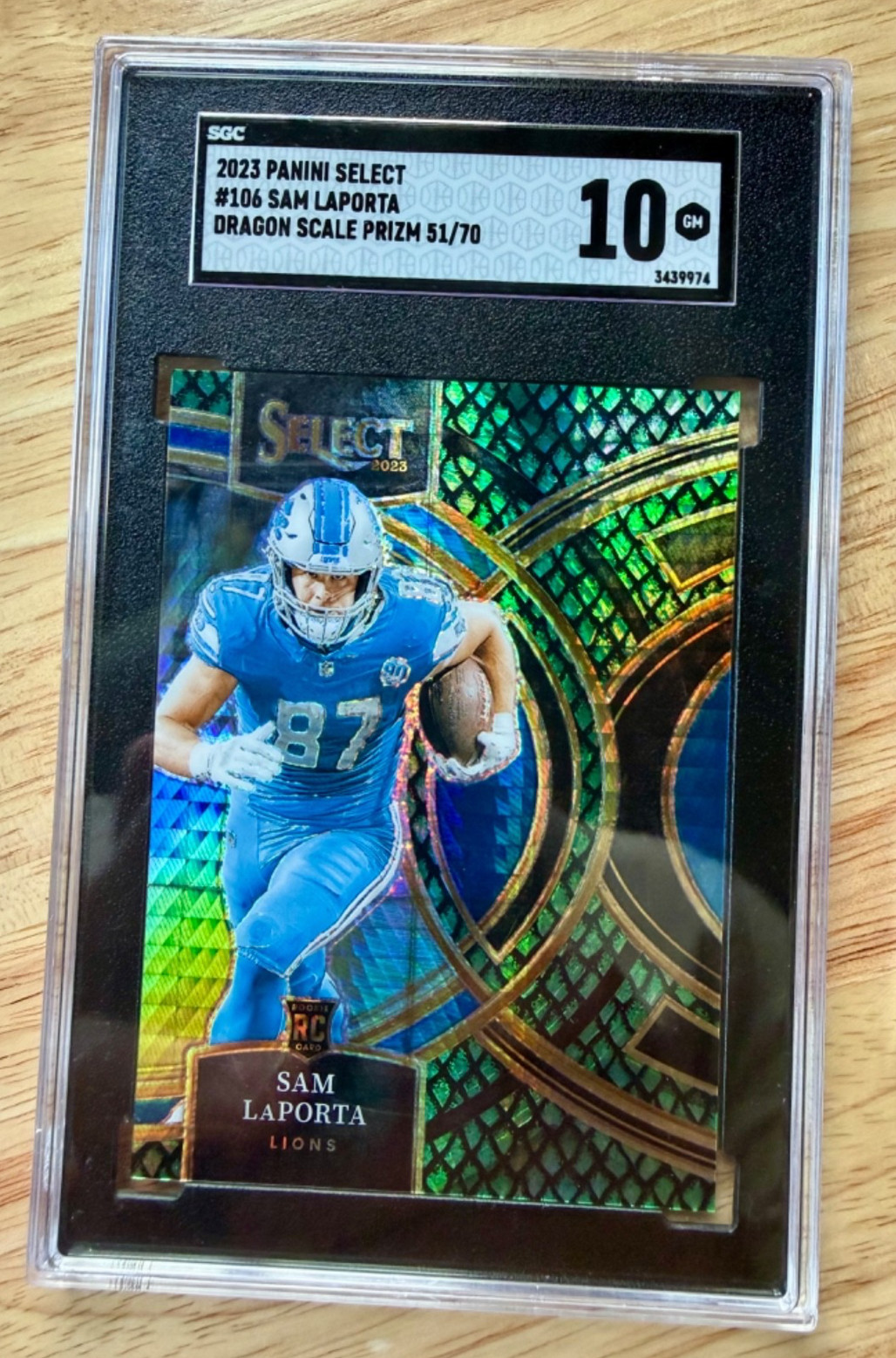 2023 Panini Select – Premier Level Sam LaPorta #106 Dragon Scale Prizm /70 (RC)