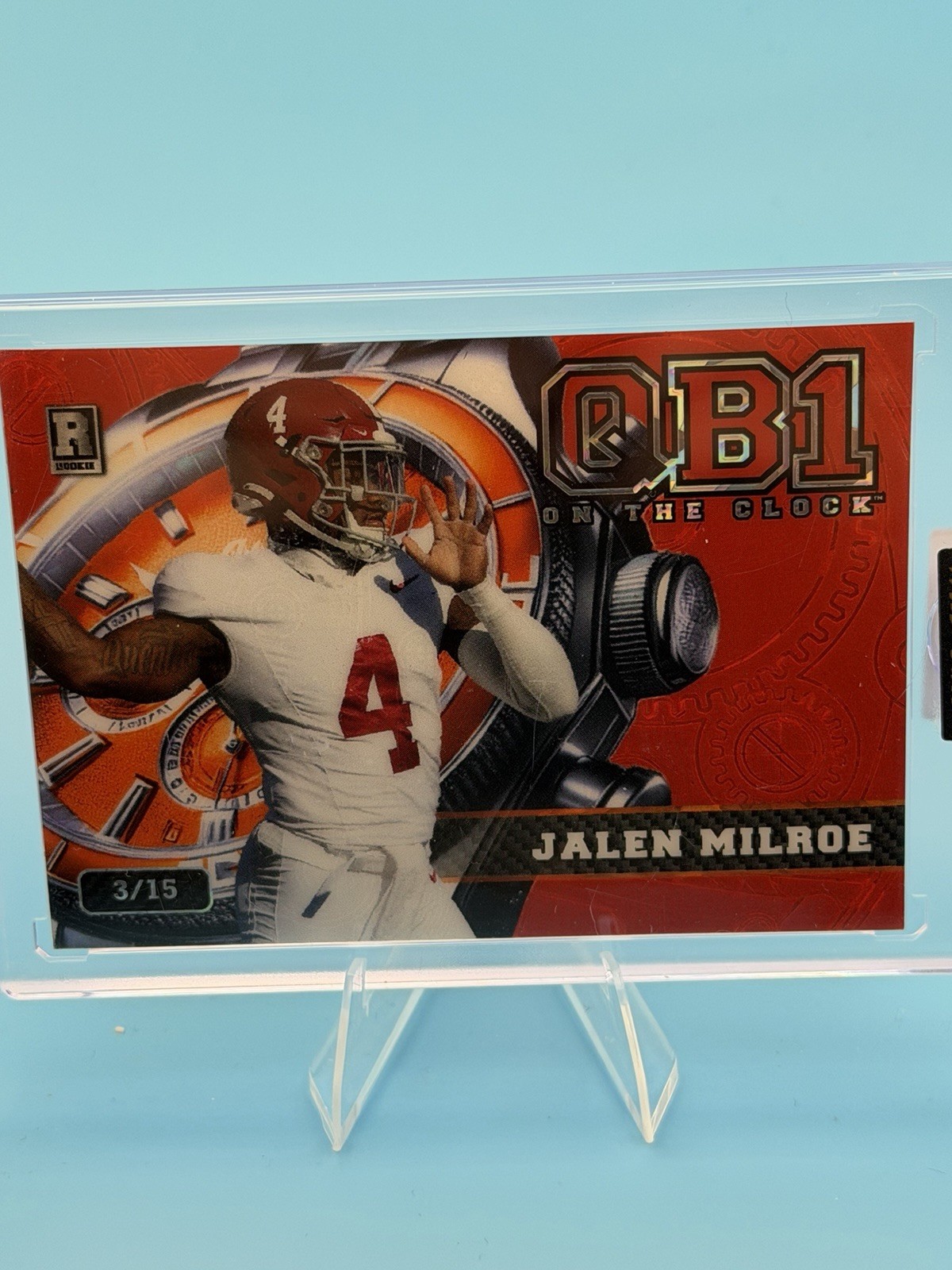 2024 Wild Card QB1 Jalen Milroe RC On The Clock Red Foil, Orange Clock 2/15.