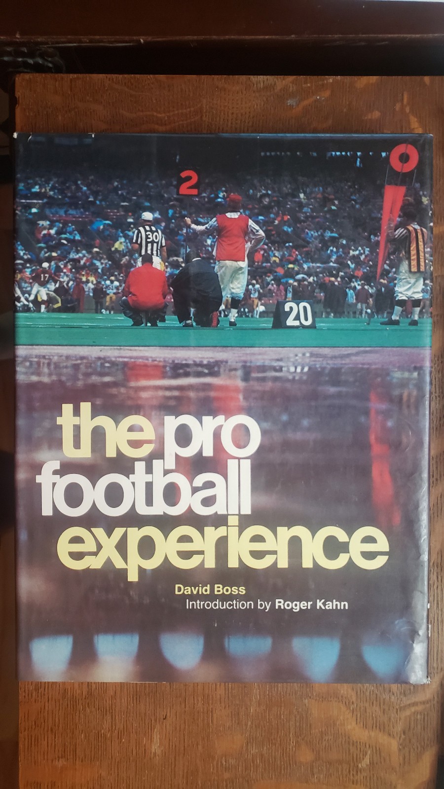 “The Pro Football Experience” by David Boss (1977). Best large photo book.