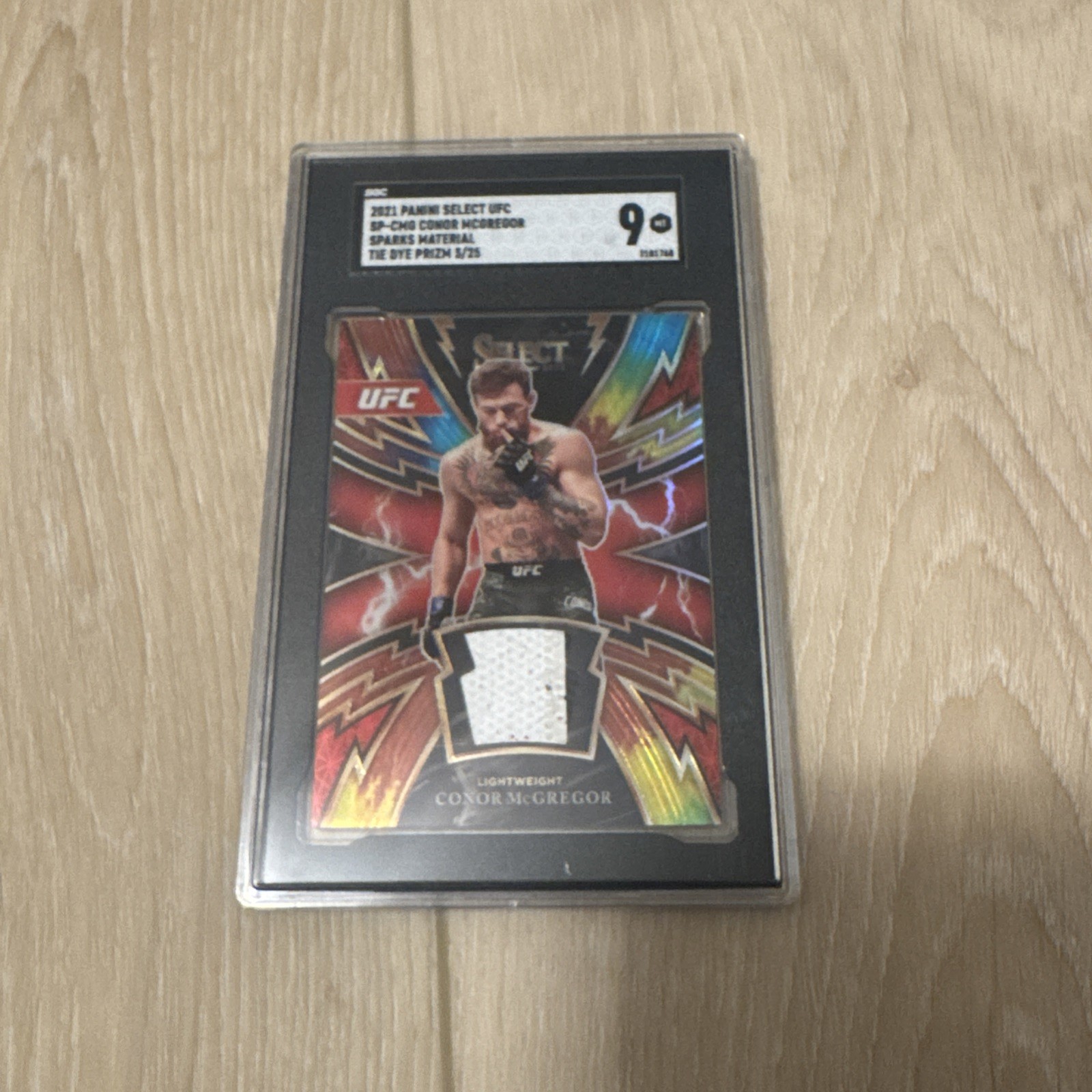 2021 Panini Select UFC Sparks Conor McGregor Relic Tie Dye /25 Blood Stain