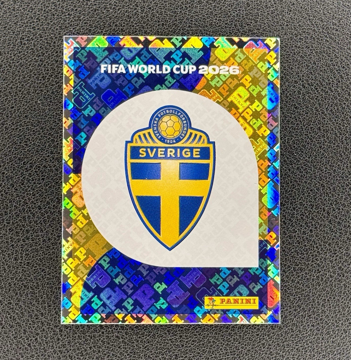 Panini FIFA World Cup 2026 Sticker Sweden SWE 1 Club Badge/Logo Hologram