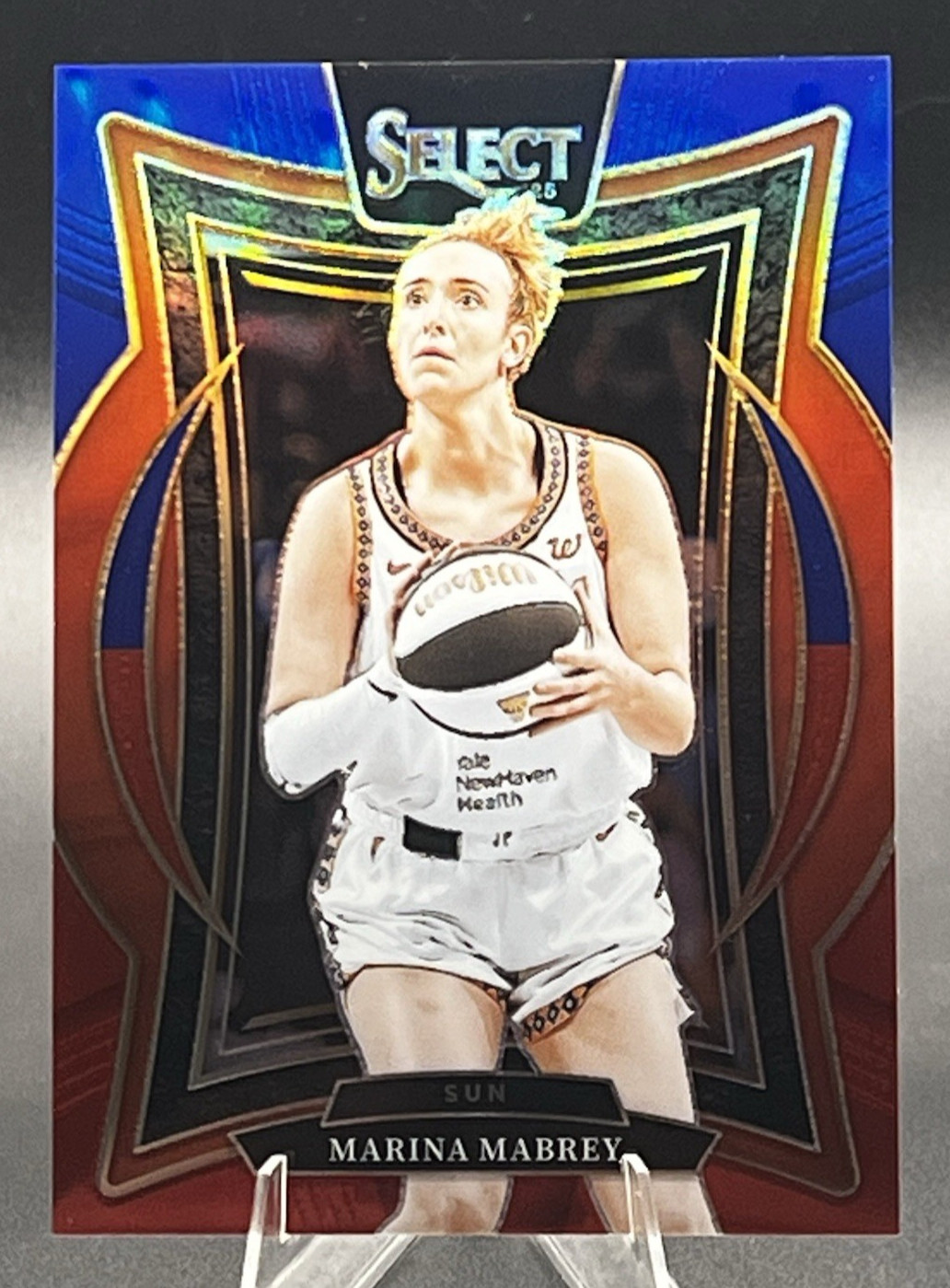 2025 Panini Select WNBA #71 Marina Mabrey Prizm Red and Blue #/399