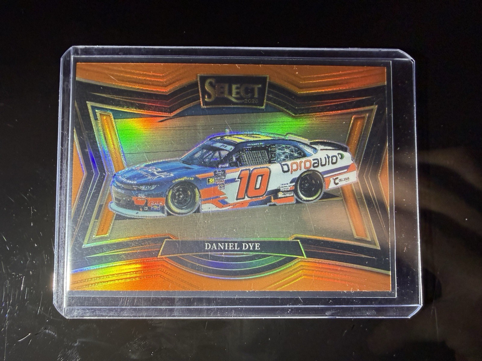 2025 Panini Select – Pit Road Daniel Dye, Daniel Dye #130 Orange Prizm /49