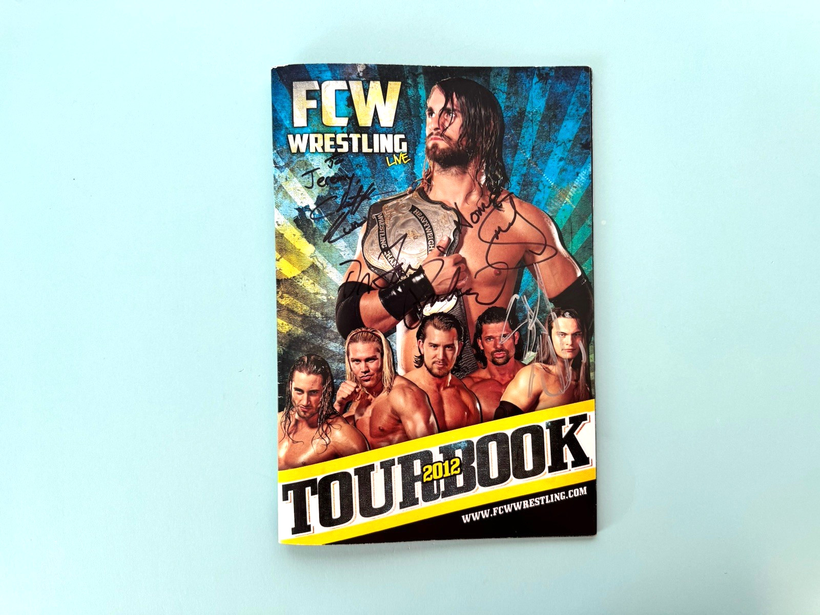 2012 FCW Tourbook Seth Rollins Bray Wyatt Husky Harris auto signed Leakee Roman
