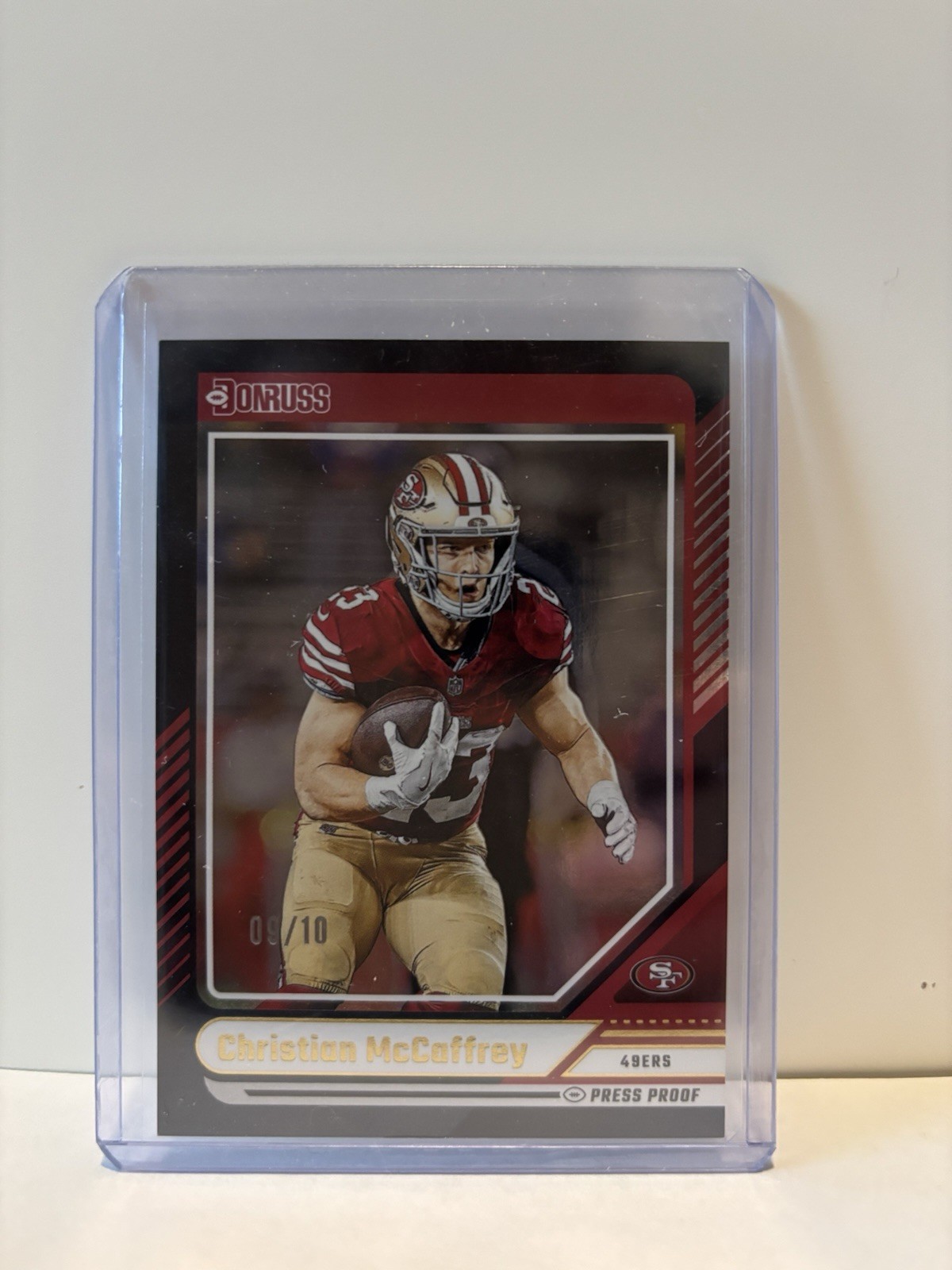 2024 Panini Donruss Christian McCaffrey #205 Black Press Proof /10