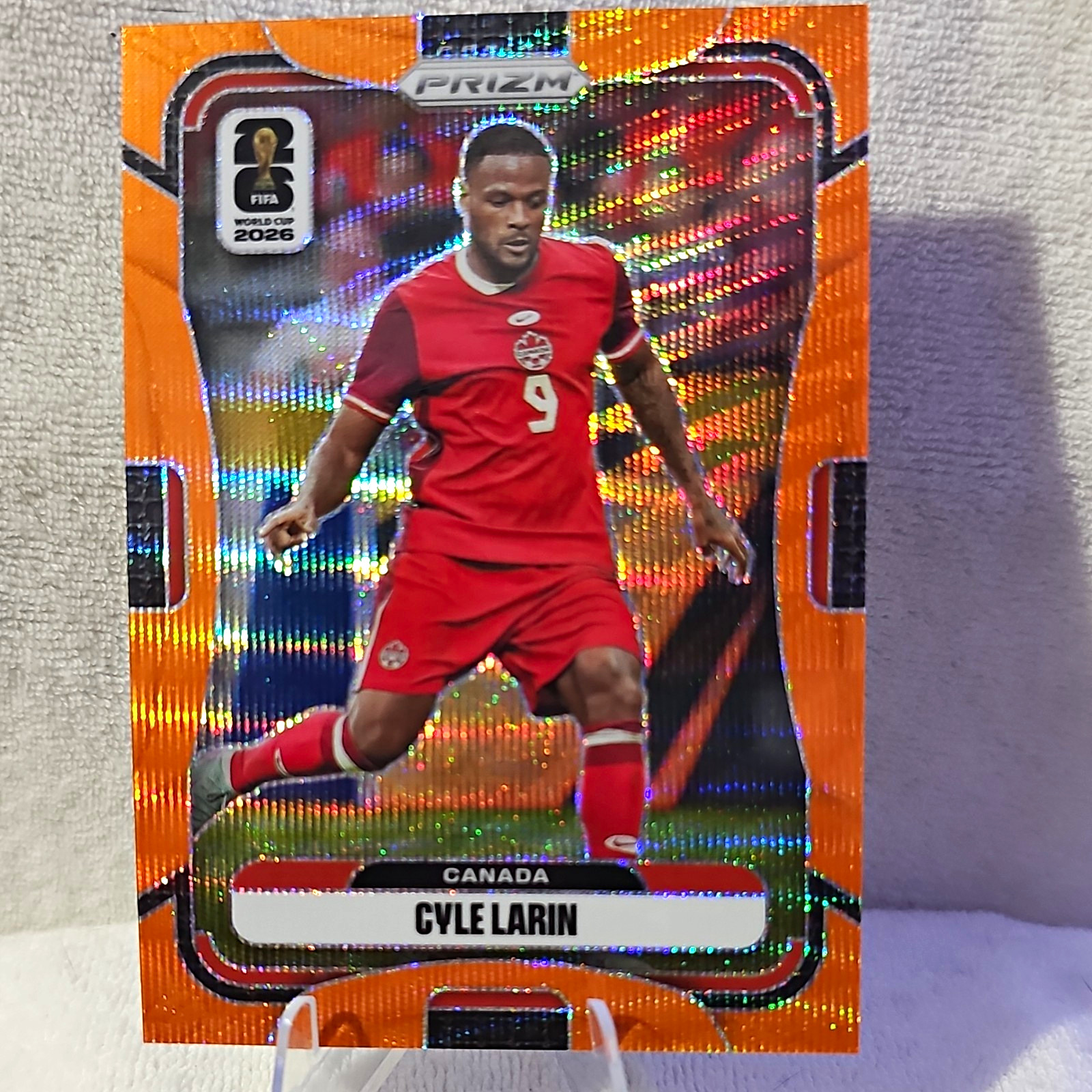 2026 Panini Prizm FIFA World Cup Cyle Larin Orange Wave Prizm 57/125 #164