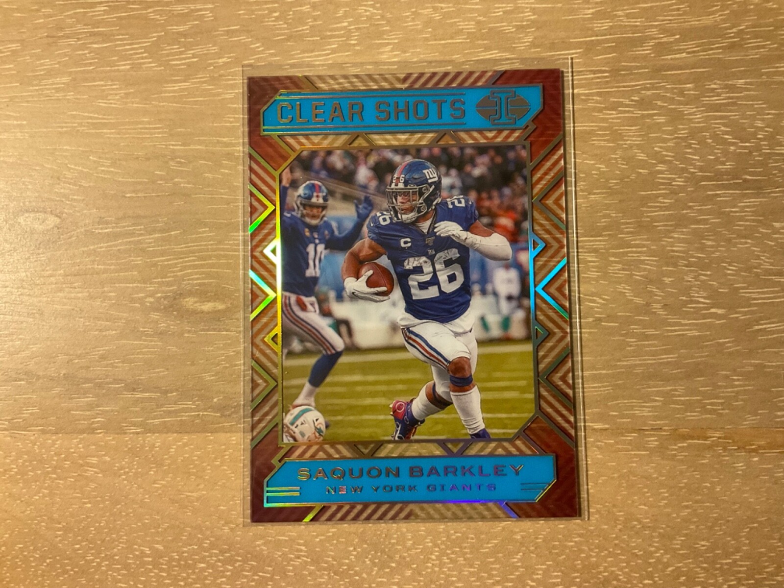 2020 Panini Illusions Football Saquon Barkley Clear Shots Light Blue 200/299 SP