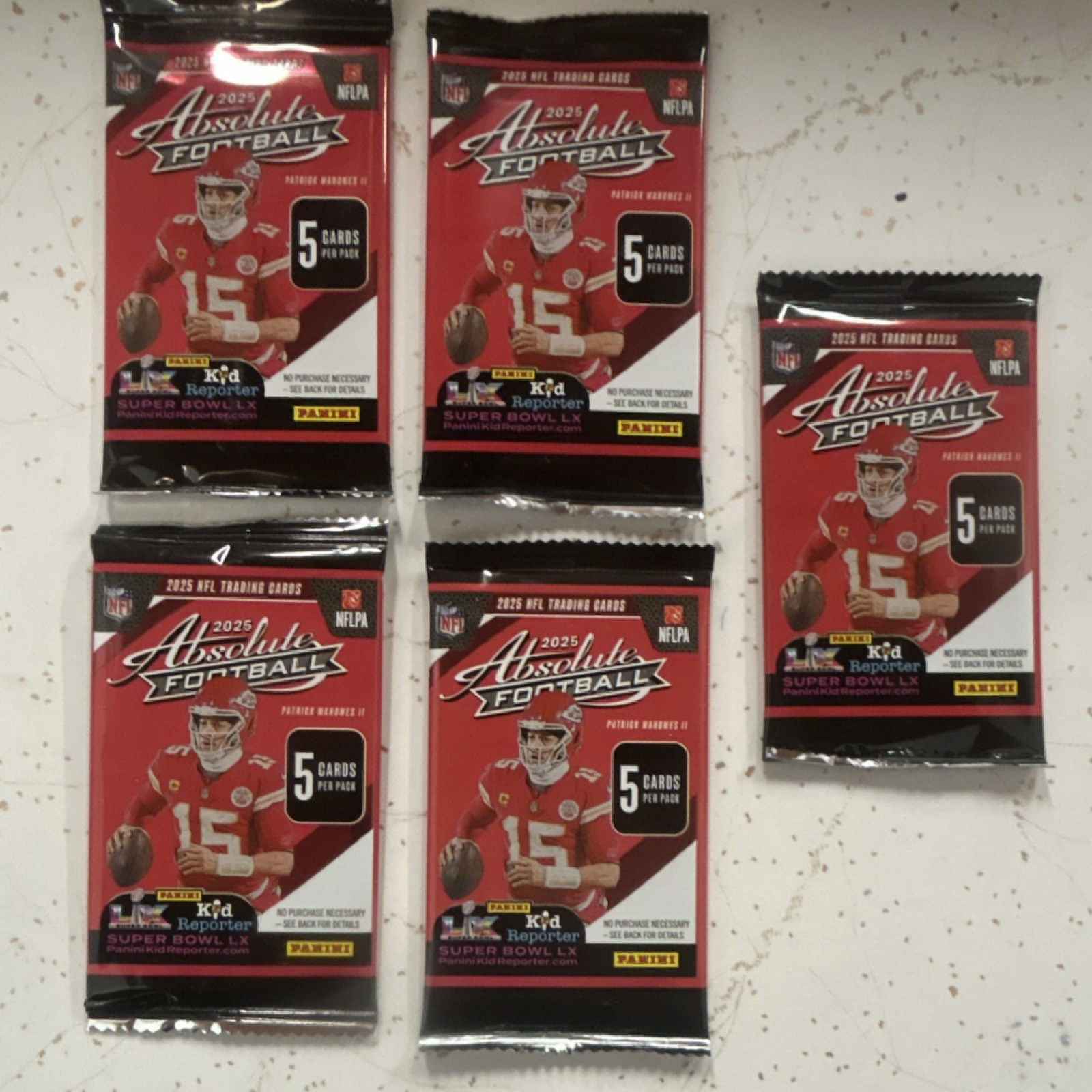 Panini 2025 Absolute Football NFL 5 Packs x 5 Cards Chiefs Mahomes Kid Reporter