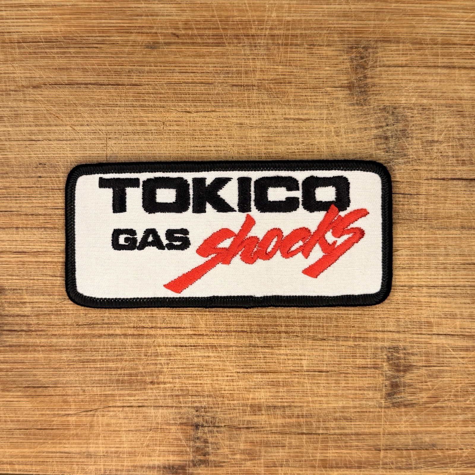 Embroidered Patch Tokico Gas Shocks Automotive Racing Garage 4.5x2in