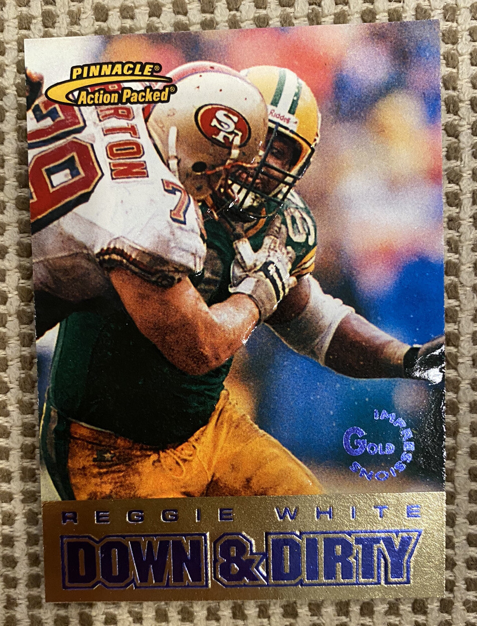 1997 Pinnacle Action Packed Down and Dirty Gold Impressions Reggie White #120