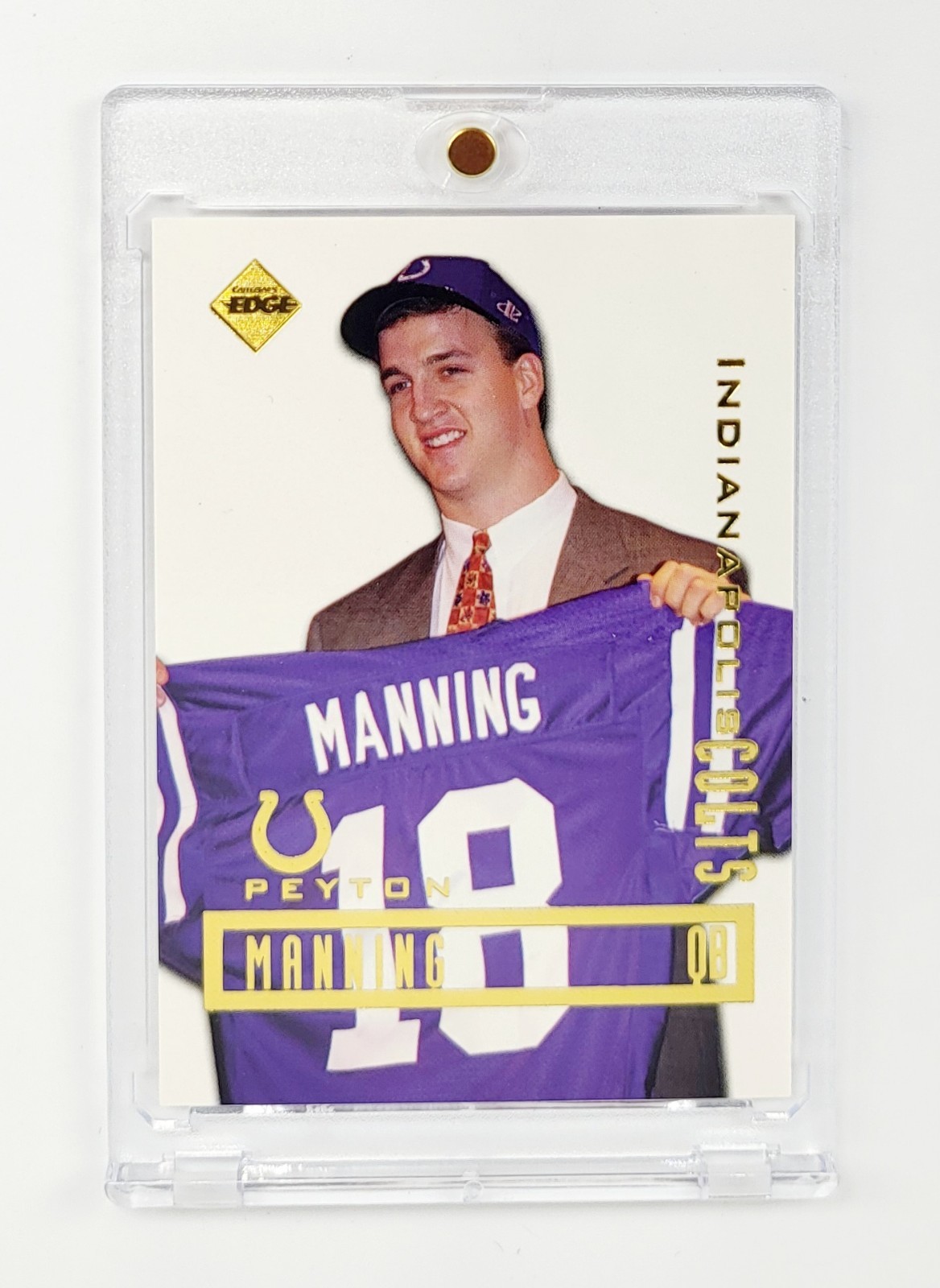 MINT ROOKIE 1998 Collector’s Edge Peyton Manning Peyton Manning (Holding jersey)