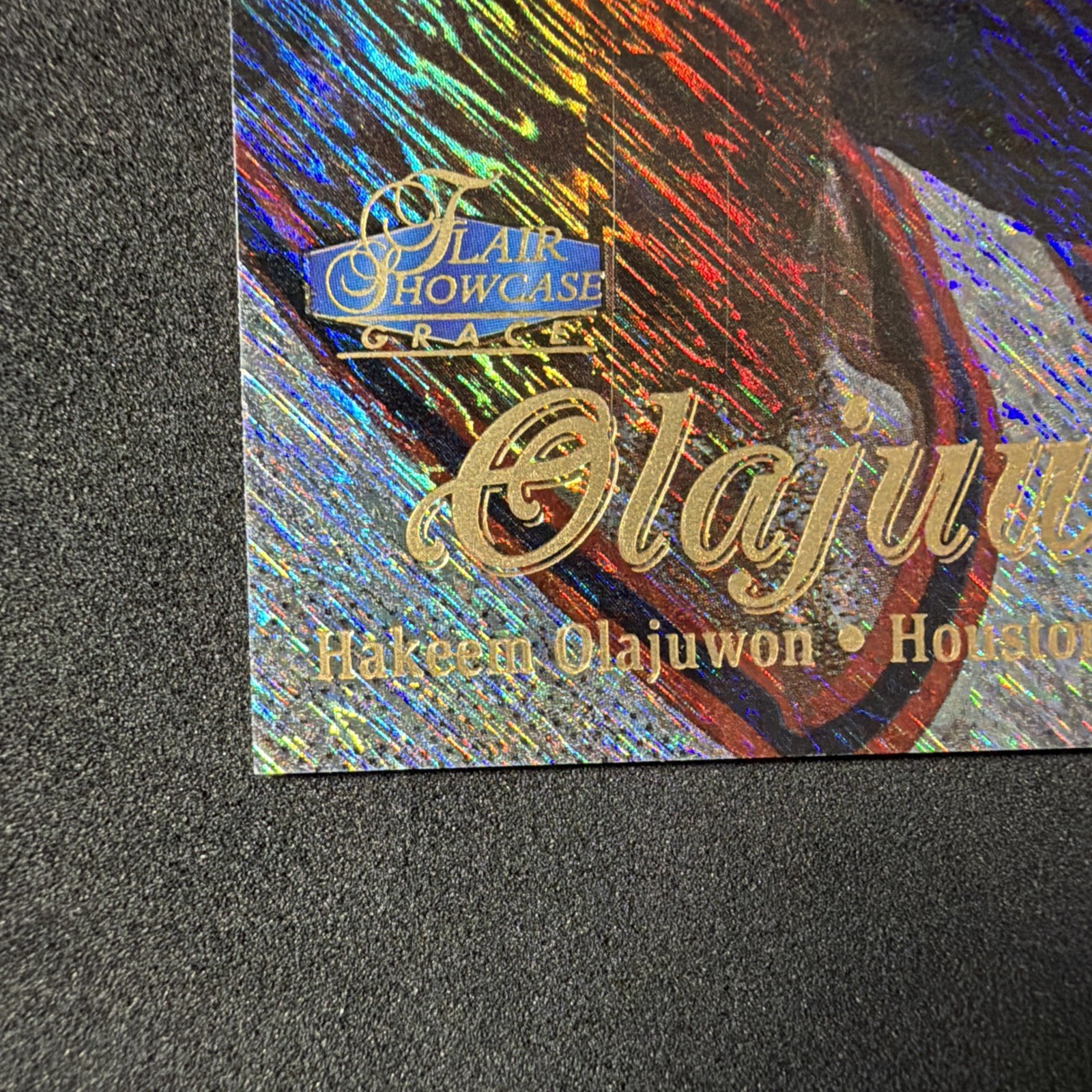 1997-98 Flair Showcase – Hakeem Olajuwon #28 Row 1