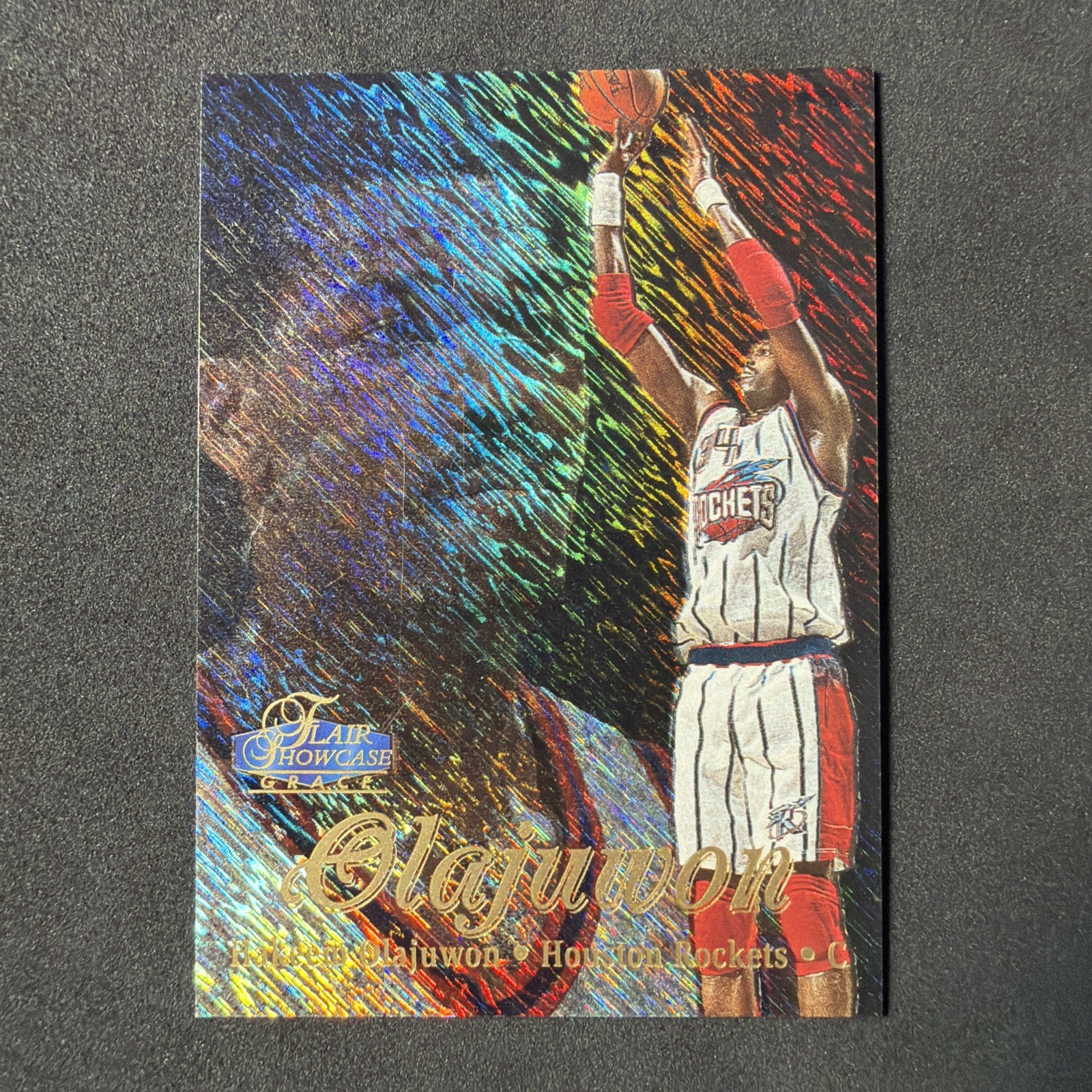 1997-98 Flair Showcase – Hakeem Olajuwon #28 Row 1