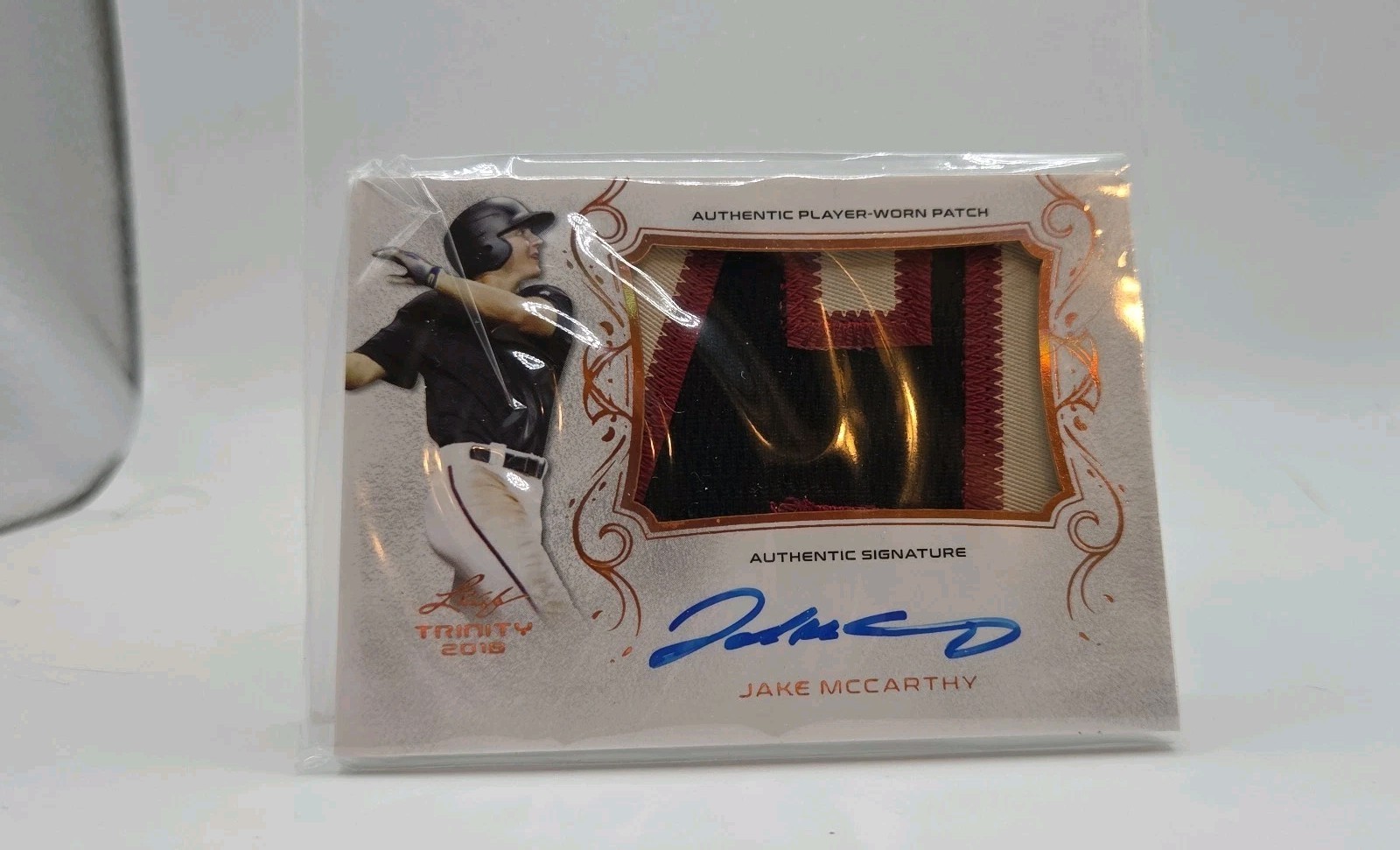 2018 Leaf Trinity – Patch Autographs Jake McCarthy #PA-JM1 (AU, MEM, RC)
