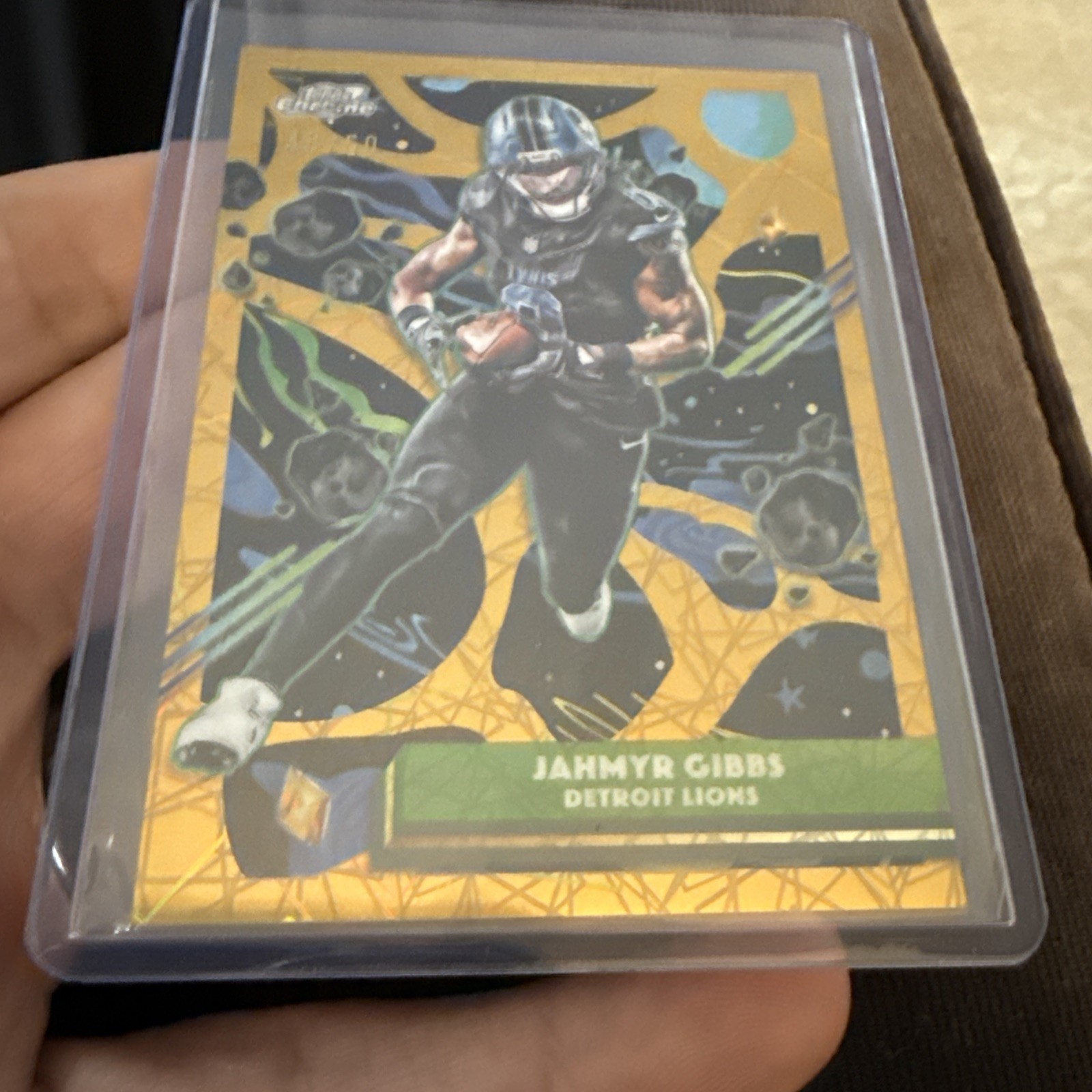 2025 Topps Cosmic Chrome Jahmyr Gibbs Gold Interstellar Lights /50 NFL SP Lions