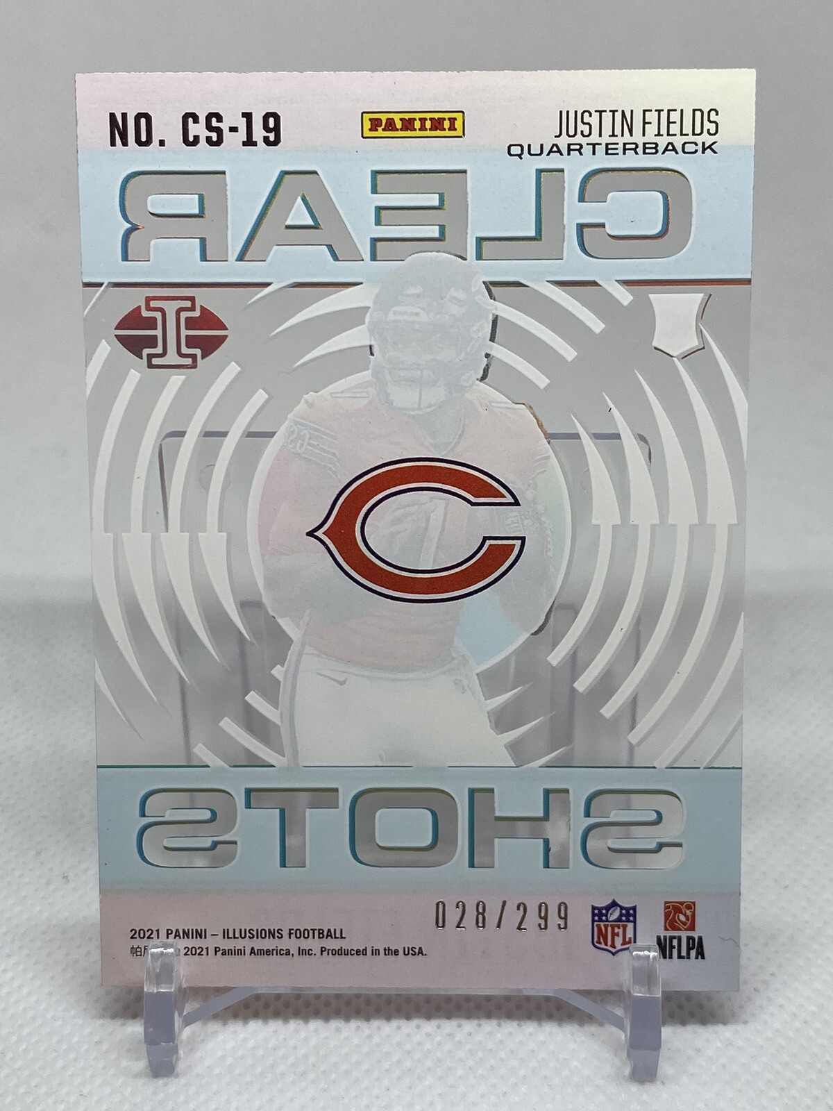 Justin Fields 2021 Panini Illusions Clear Shots Insert RC Light Blue SN 028/299