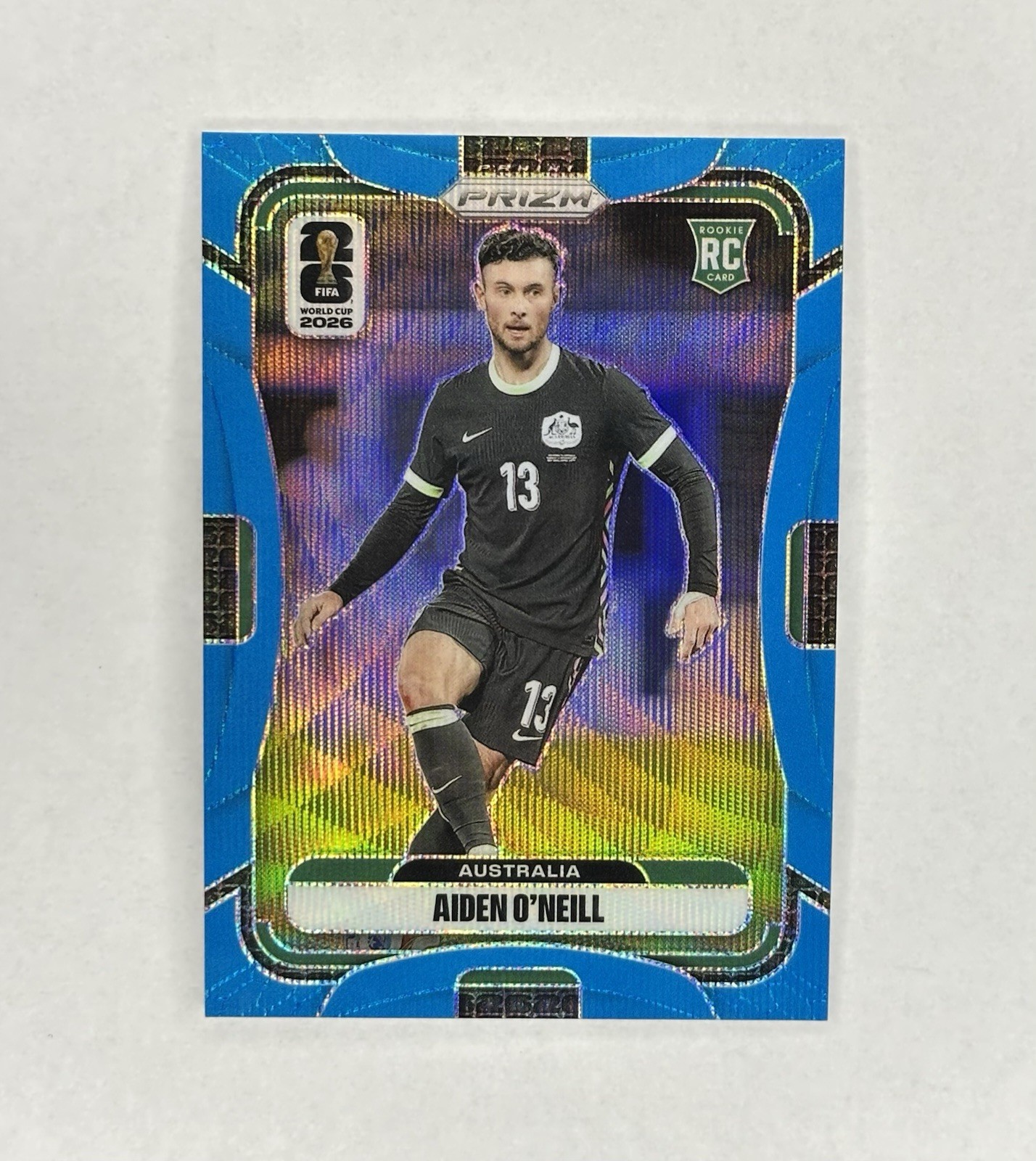 2026 Panini Prizm FIFA Aiden O’Neill #139 Teal Wave Prizm /225 – Australia (RC)