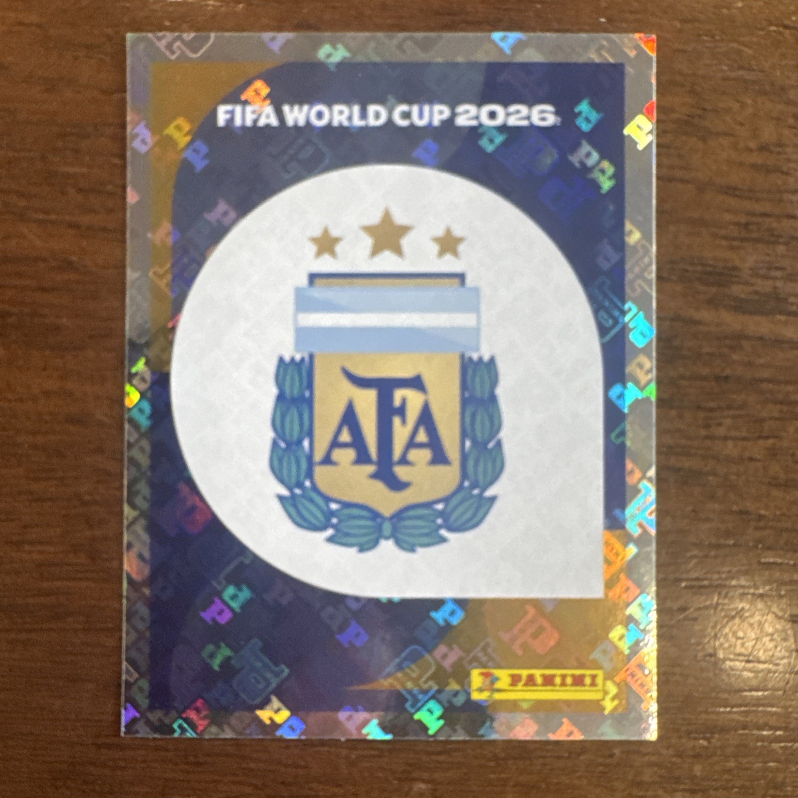 Panini FIFA World Cup 2026 ARG 1 Argentina Team Badge Sticker Unused Code