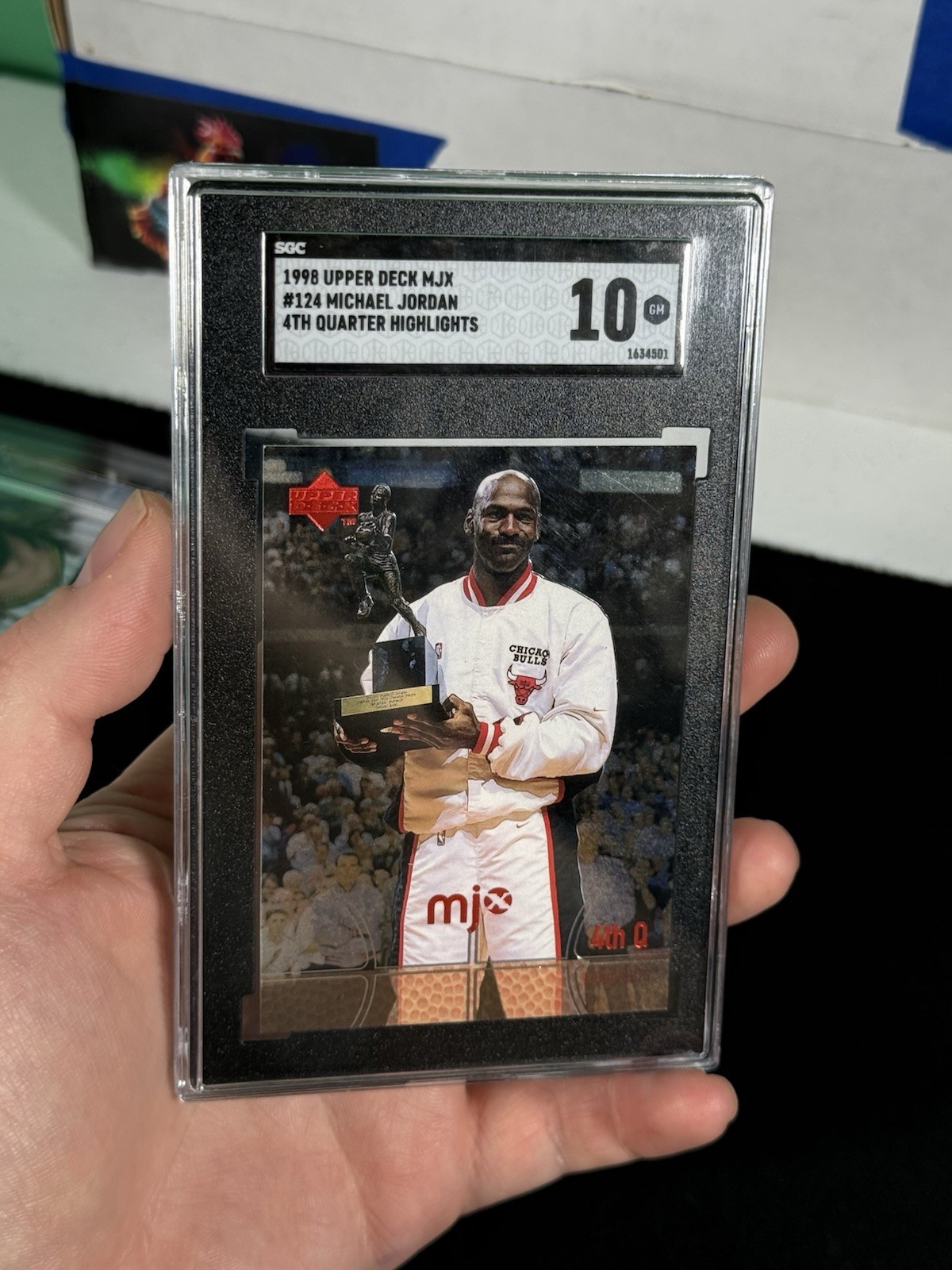 Michael Jordan 1998 Upper Deck MJx #124 SGC 10 GM HOLDING MVP TROPHY GOAT HOF