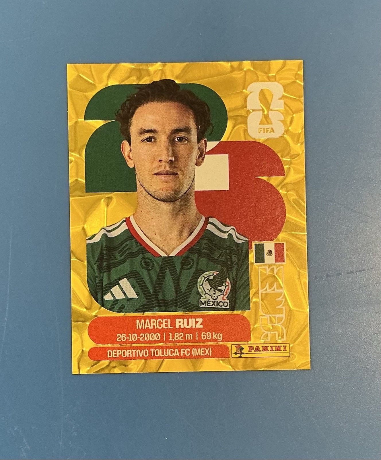 2026 Panini FIFA World Cup Sticker Gold Flood Crumple Marcel Ruiz #MEX12 Foil