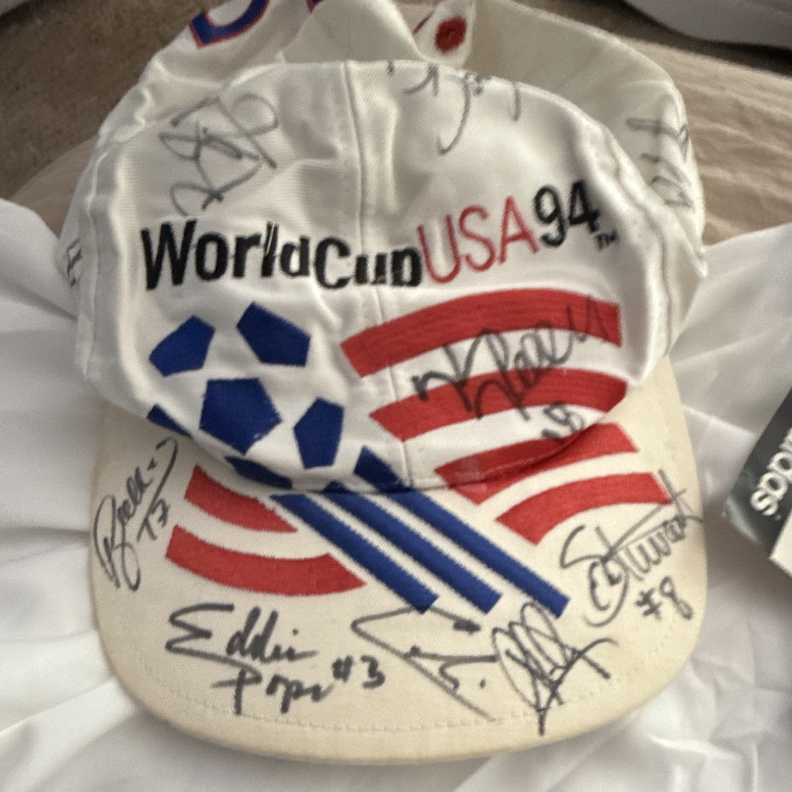 94 World Cup Home Jersey and hat signed by team.