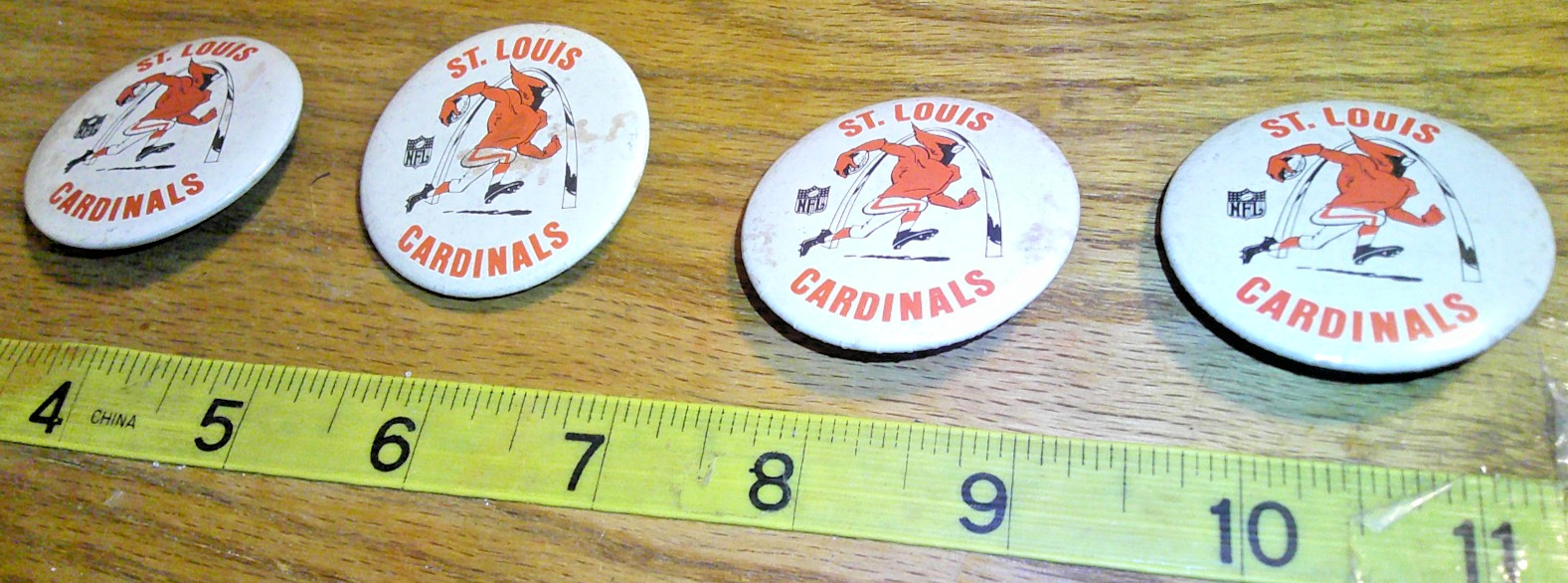 4 vintage St. Louis Cardinals Pinbacks NFL approximately 1 3/4 inches with Arch