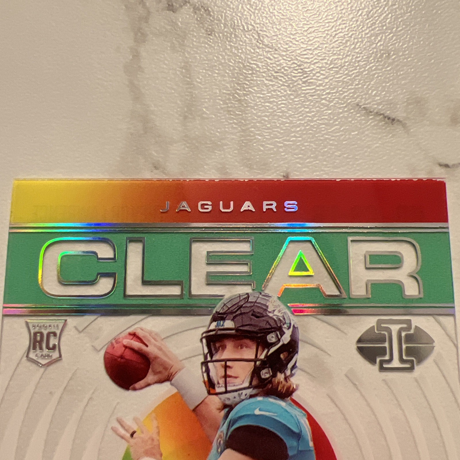 2021 Trevor Lawrence Panini Illusions Clear Shots Light Blue /299 RC
