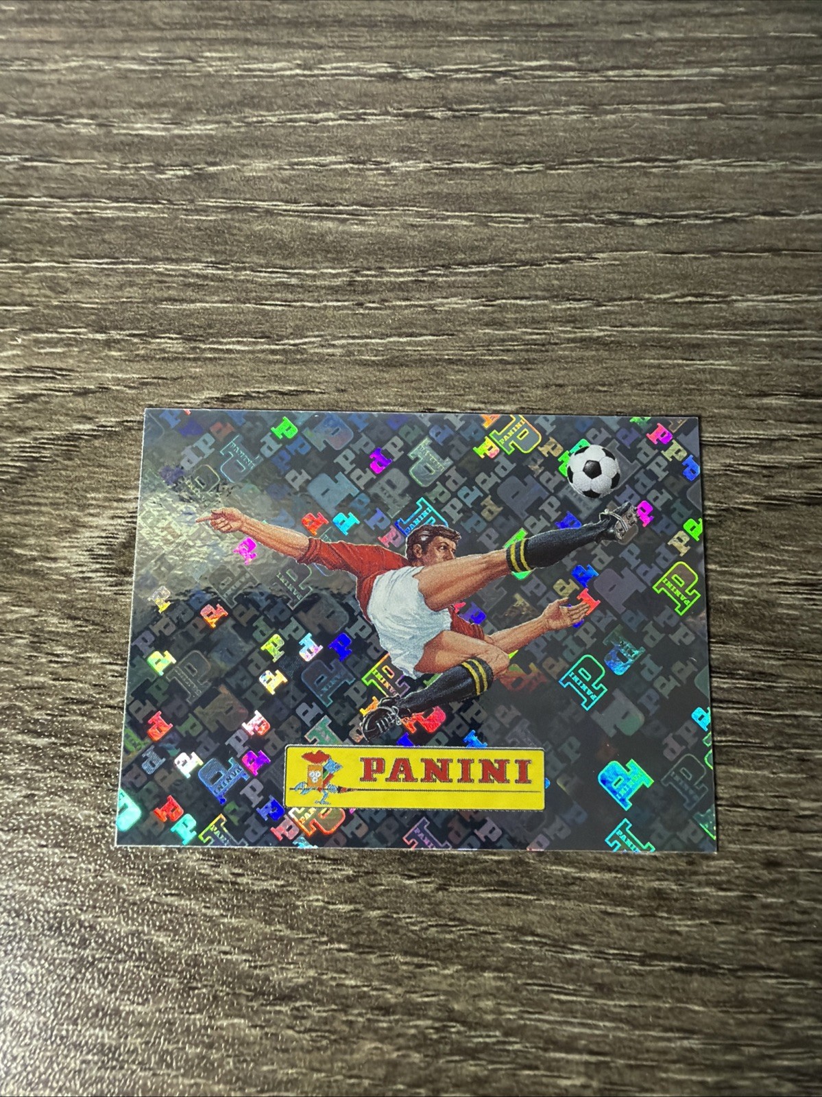 2026 Panini FIFA World Cup Sticker #00 BOOKS FIRST CARD! SSP 🔥PANINI LOGO FOIL