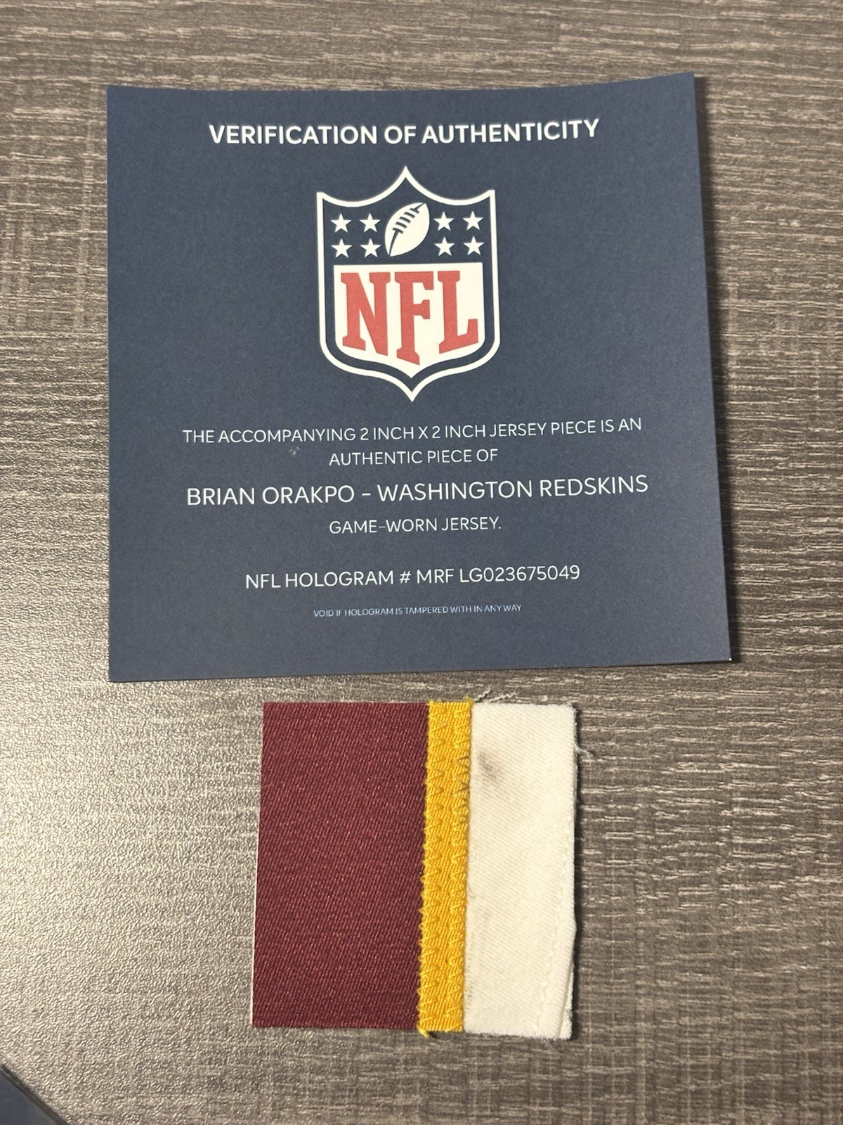 BRIAN ORAKPO GAME USED WORN DIRTY PATCH NFL COA HOLOGRAM WASHINGTON REDSKINS